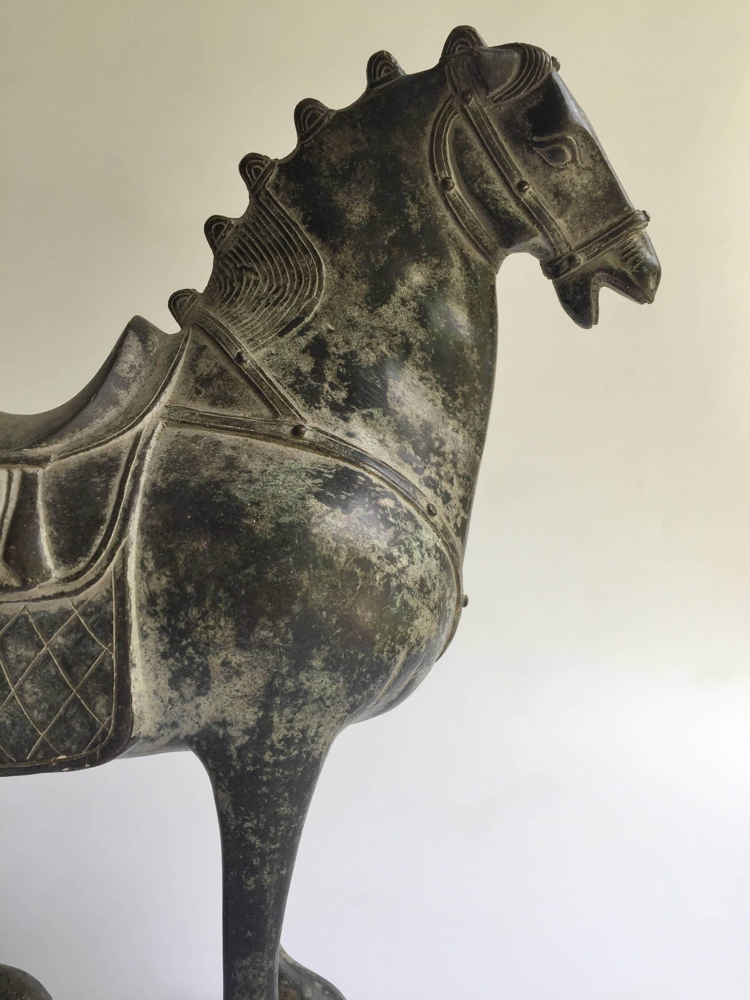Magnificent bronze horse in the ancient Han style. The piece's craftsmanship is superb with Fine details. The horse's expression is vivid and lively, his muscles well defined and powerful. His accessories are exquisite.

Horse in the Chinese