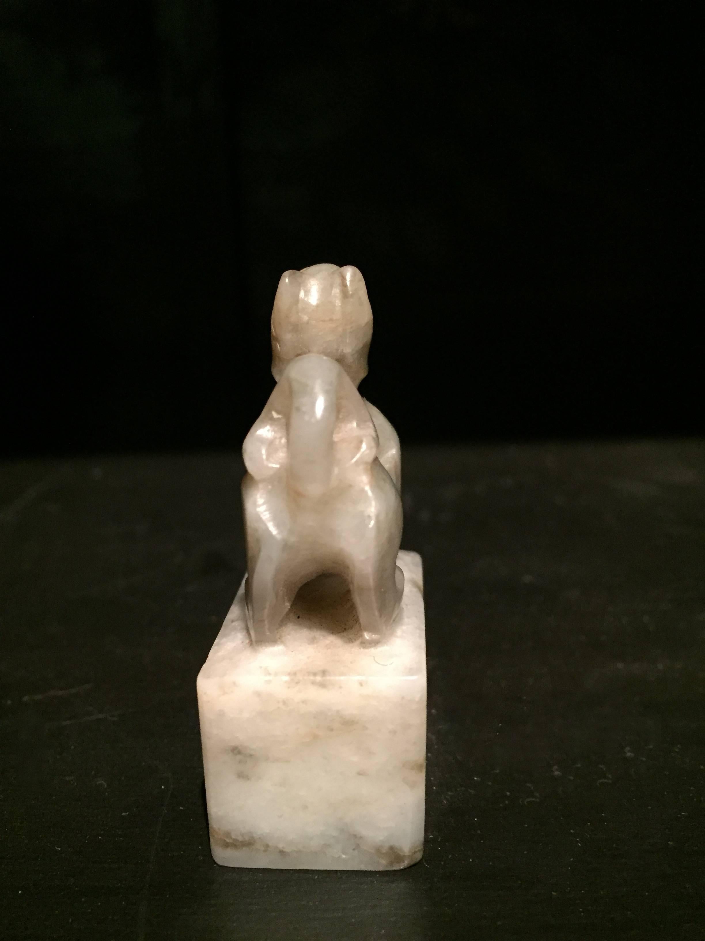 19th Century Pair of He Tian Rice Texture Jade Foo Dog Lion Chops For Sale 1