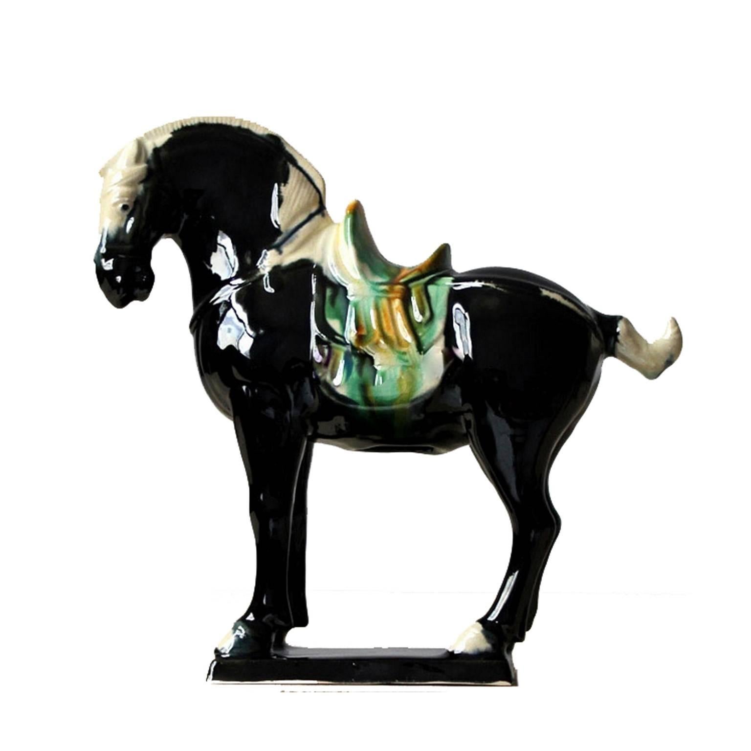 This set of beautiful terracotta horses are hand made and painted using the ancient Tri-Glaze techniques. The Sancai technique dates back to the Tang Dynasty (618–907AD). It is a true work of art. From the choice of colors to the way glaze is