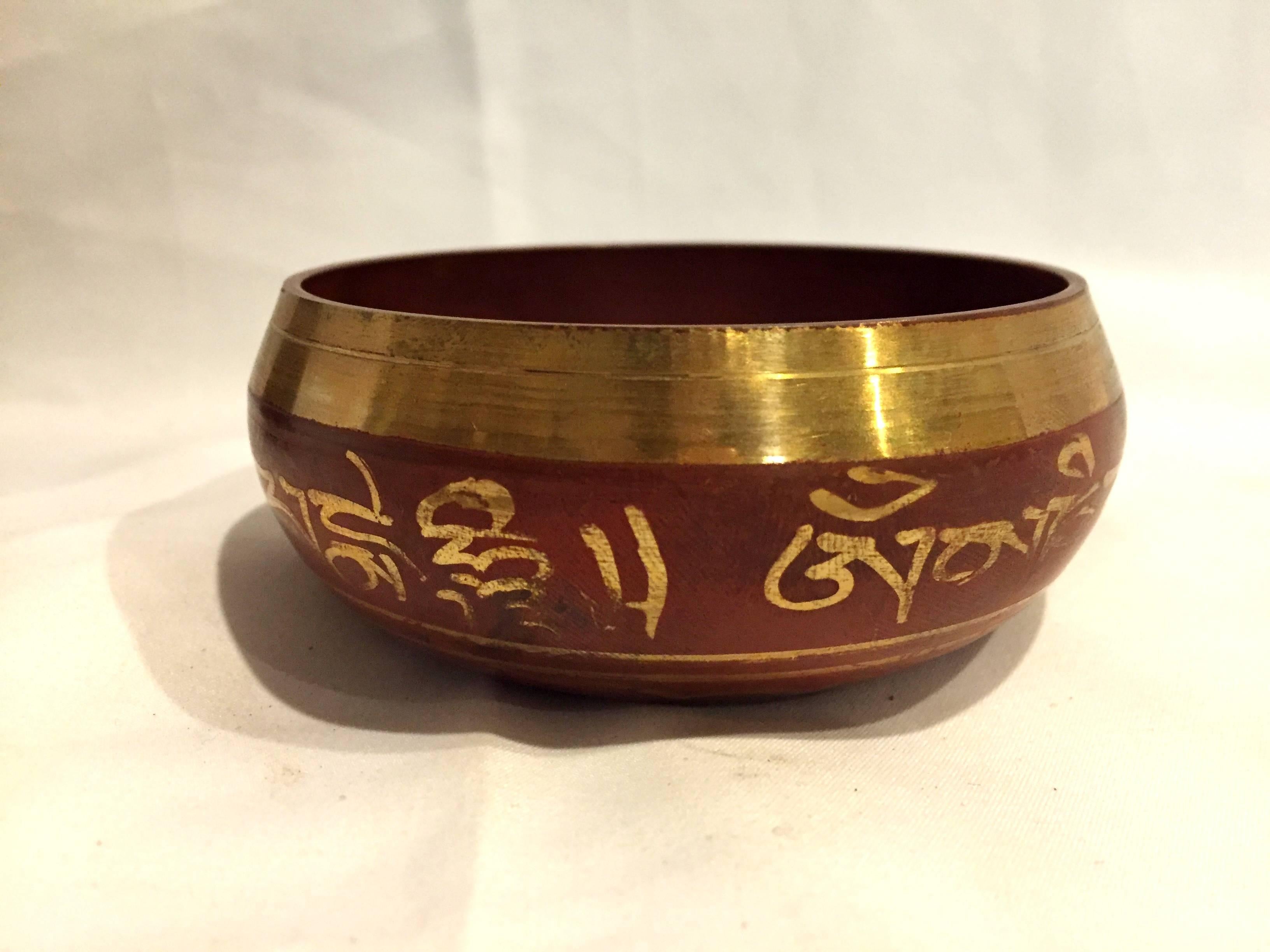 Included in this fantastic collection are the following:

A brass singing bowl with its own striker. The bowl has wonderful, raised center in the form of two Dorjes, which are ritual objects used in ceremonies symbolizing enlightenment. 4