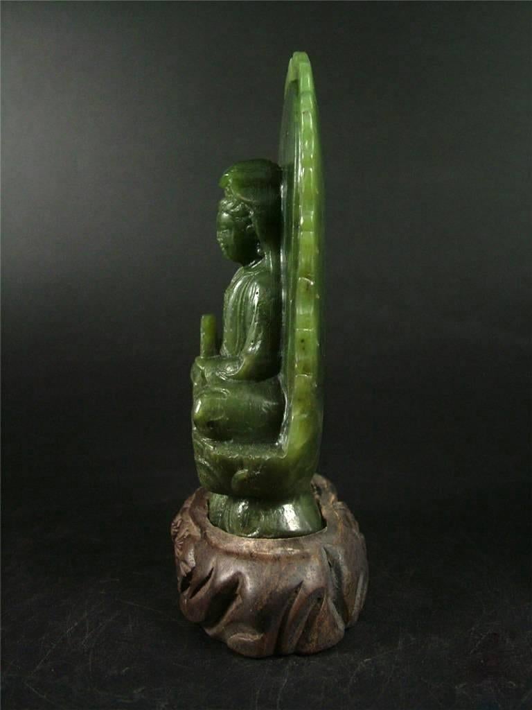 Antique Spinach Green Jade Kwan Yin on Carved Stand For Sale 1