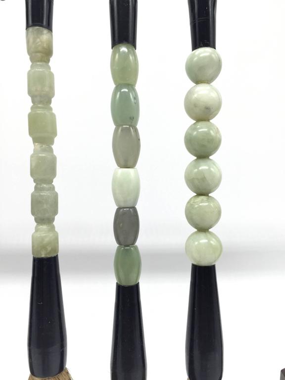 Set of Four Jade Calligraphy Brushes and Rosewood Brush Stand For Sale