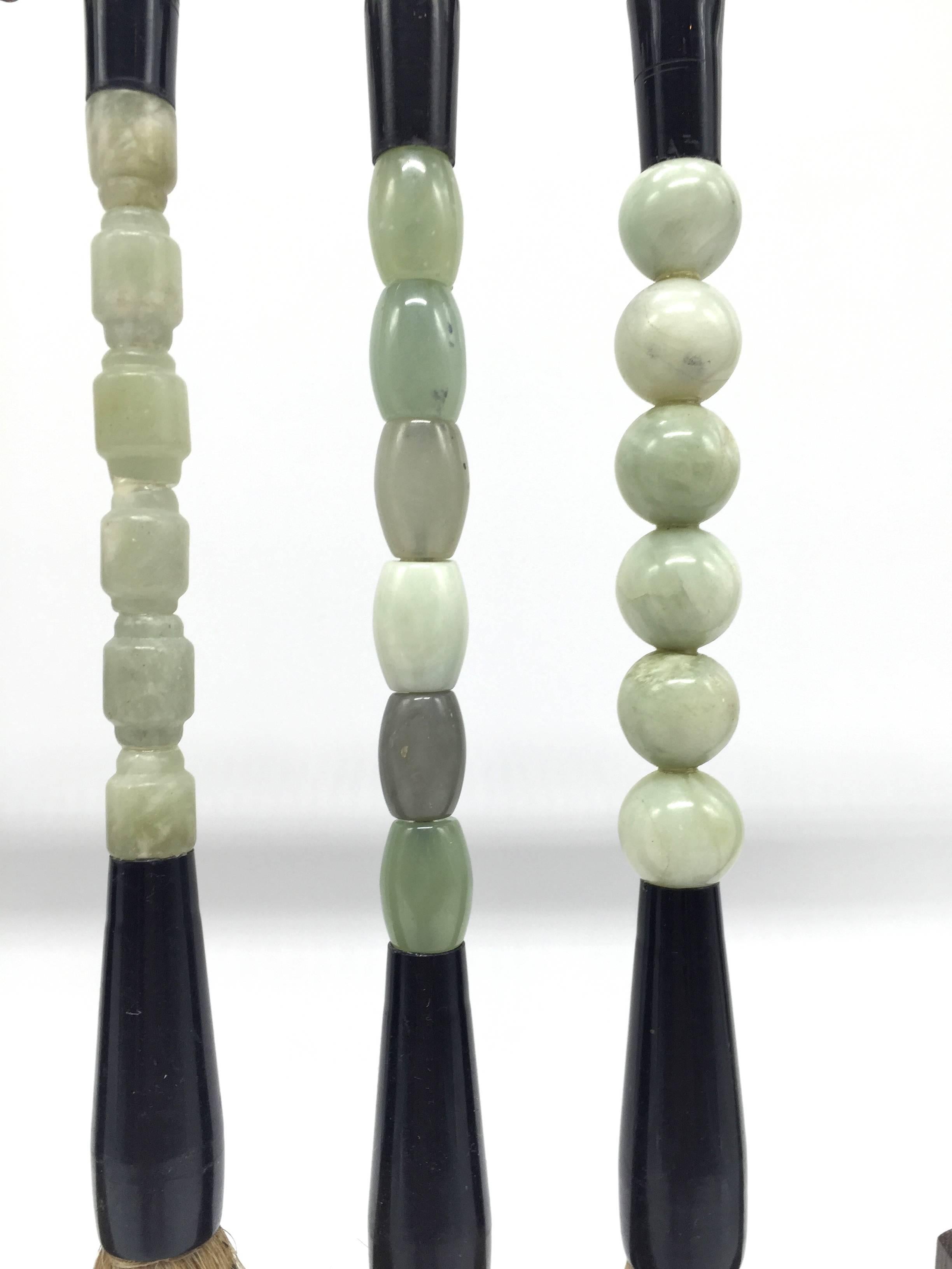 Beautiful new collection of natural jade brushes. Featured here a set of four pieces, each adorned with hand-carved jade.

These brushes make stunning displays and can be used to paint watercolor or write Chinese ink calligraphy.

All brushes