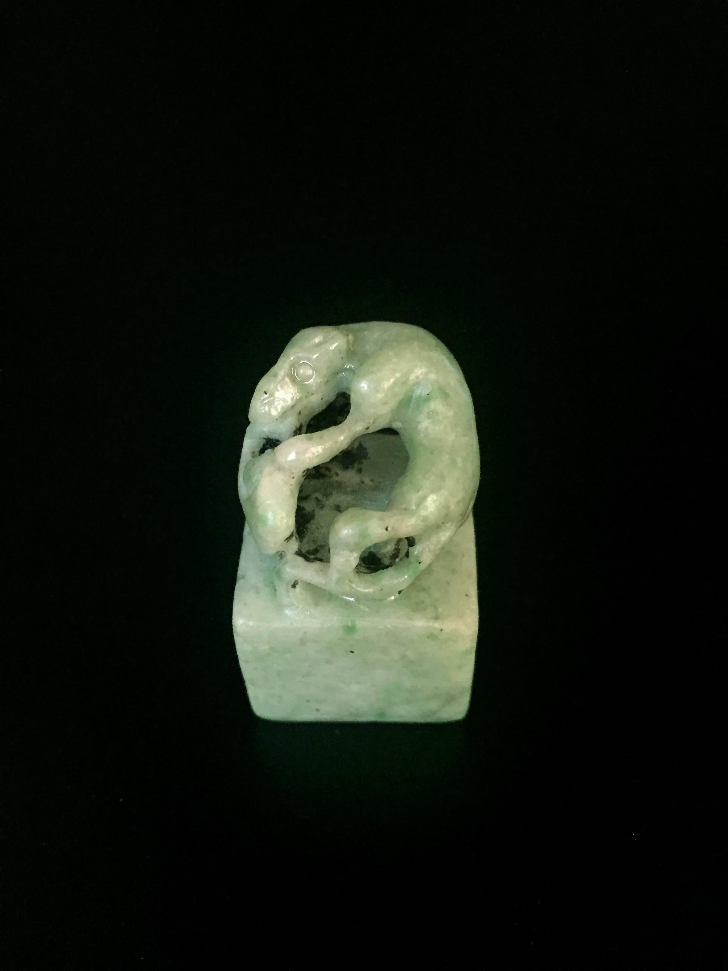 A 19th century jade chop featuring a Primitive dragon pursuing a pair of Lin Zhi, the Chinese panacea herb. 

Rare.