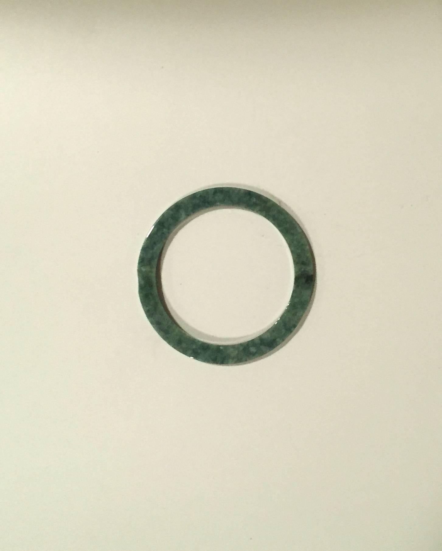 Here is a rare opportunity to acquire some very unique jade items for your interior decorations such as table settings, curtains and others. 

These pieces vary in thickness a bit but they average 1/8th of an inch. The inside diameter is