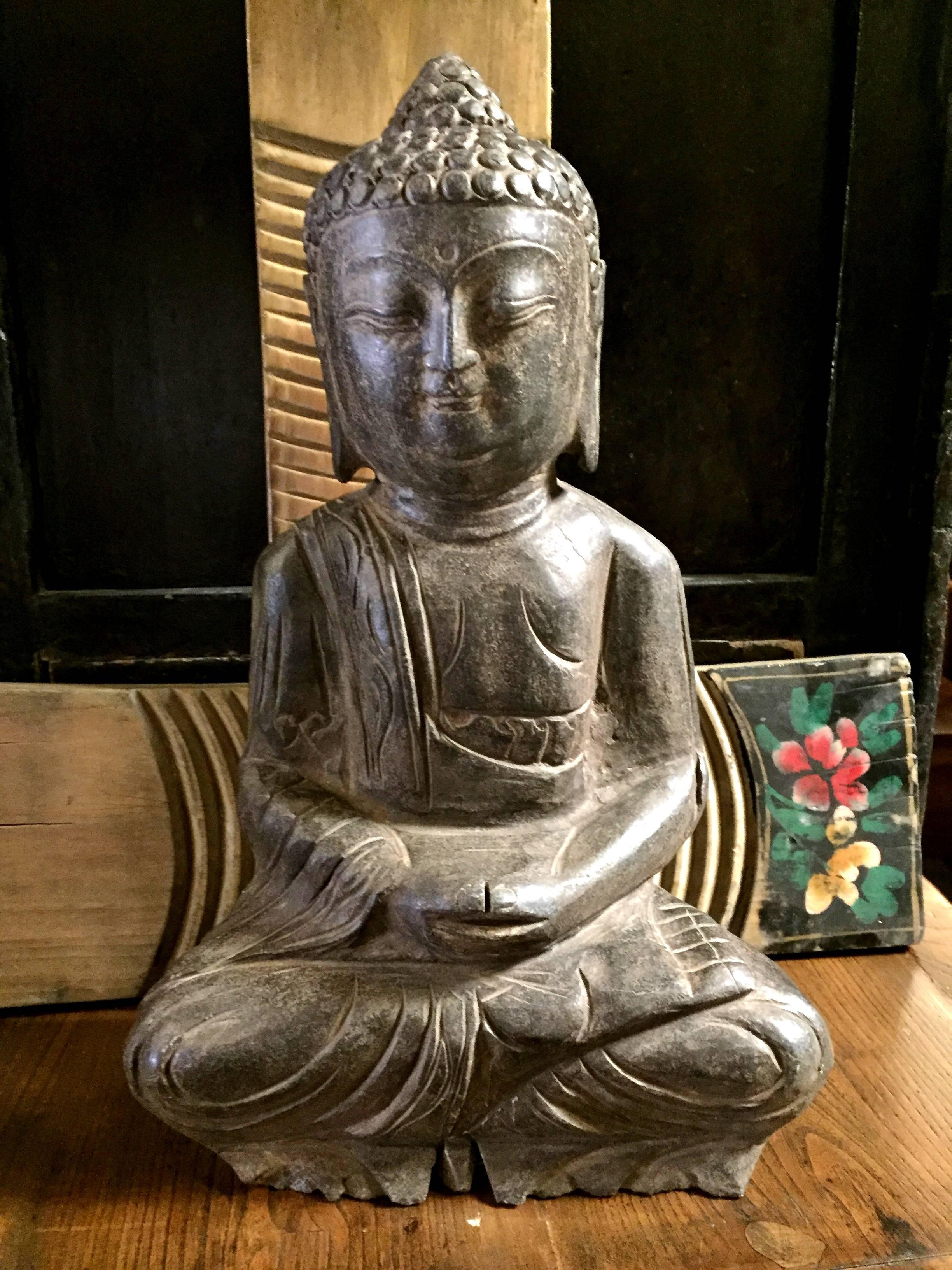 This is a beautiful stone Buddha sculpture. The piece displays fine details of head crown, facial features and robe. Peaceful expressions and overall serenity.

This is a heavy, substantial, solid stone, handcrafted piece. Perfect for indoor or
