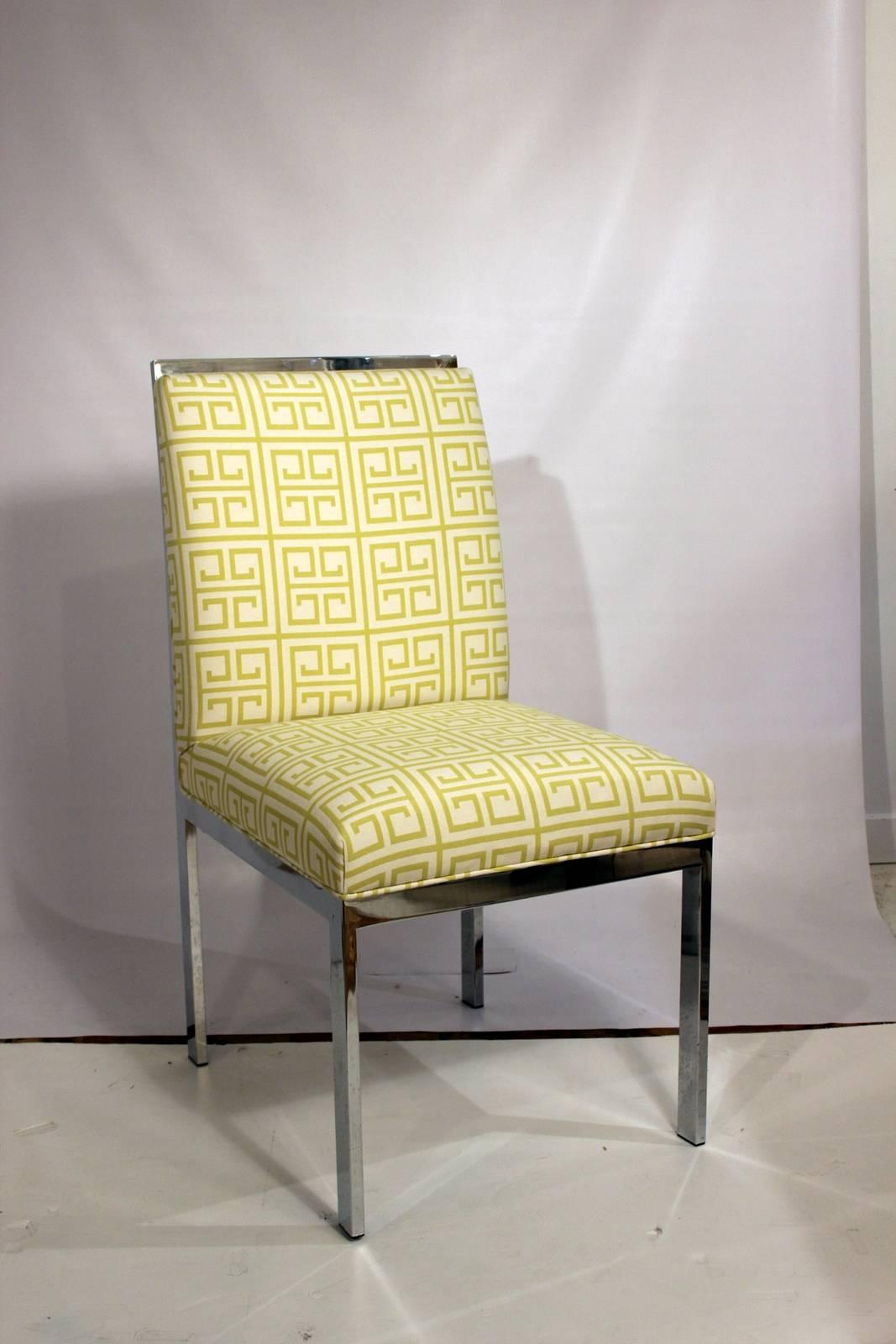 Pair of Mid-Century chrome chairs newly upholstered with Citron Greek key fabric. 
Additional fabric available $60.00 yard.