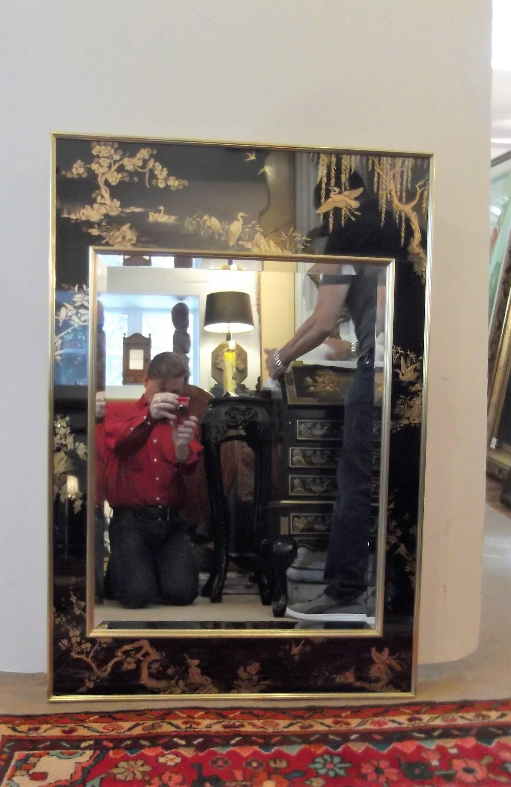 La Barge eglomise chinoiserie mirror with rare black background. These are hand-painted in reverse on the back of the glass frame and artist signed in the lower corner. The Mirror inset is beveled. The backing is a solid plywood to keep the mirror