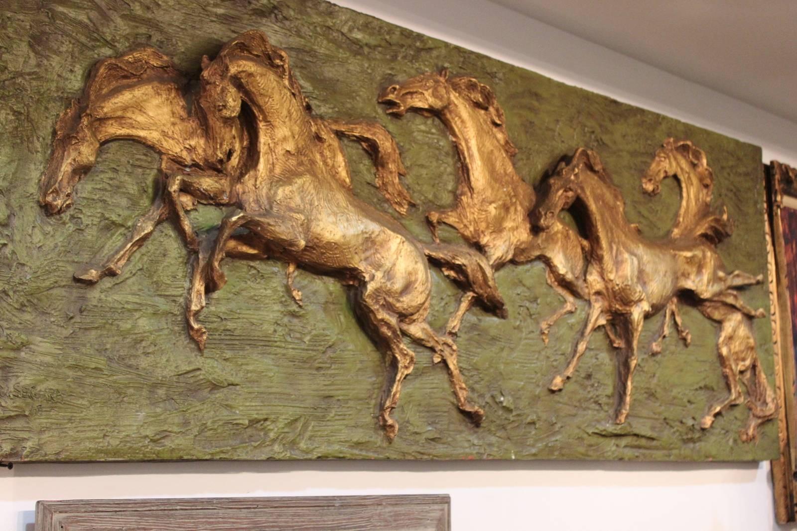 Large fiberglass mural of galloping horsed with gold leaf. Signed and dated on lower left 1962. Labeled on back Segura Studios. A highly decorative and true of the period mid-20th century. Measures: 68.5