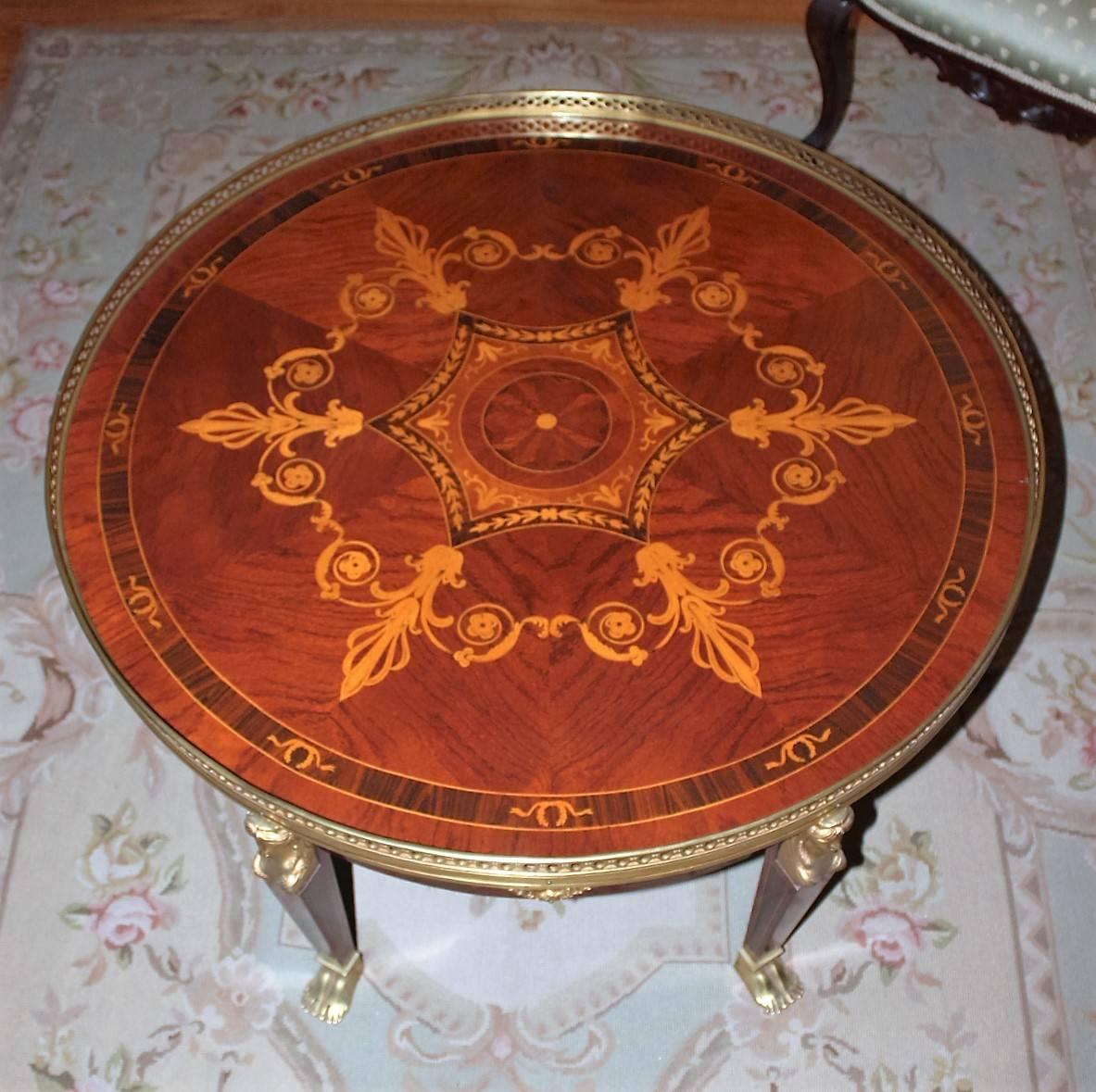 Elaborately inlaid coffee table with galley top in the French Empire style. This piece was custom-made in New Orleans for a specific client and was cabinetmaker made in the French Quarter.