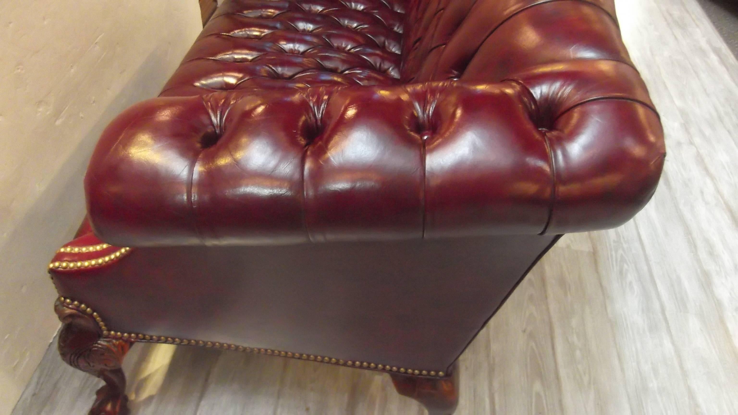 Carved Cordovan Leather Camel Back Settee
