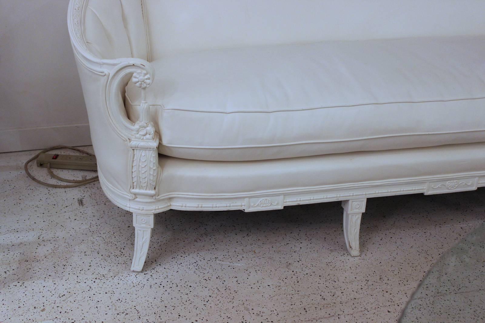 Carved Walnut Painted Sofa with White Vinyl Upholstrey In Excellent Condition In Lambertville, NJ