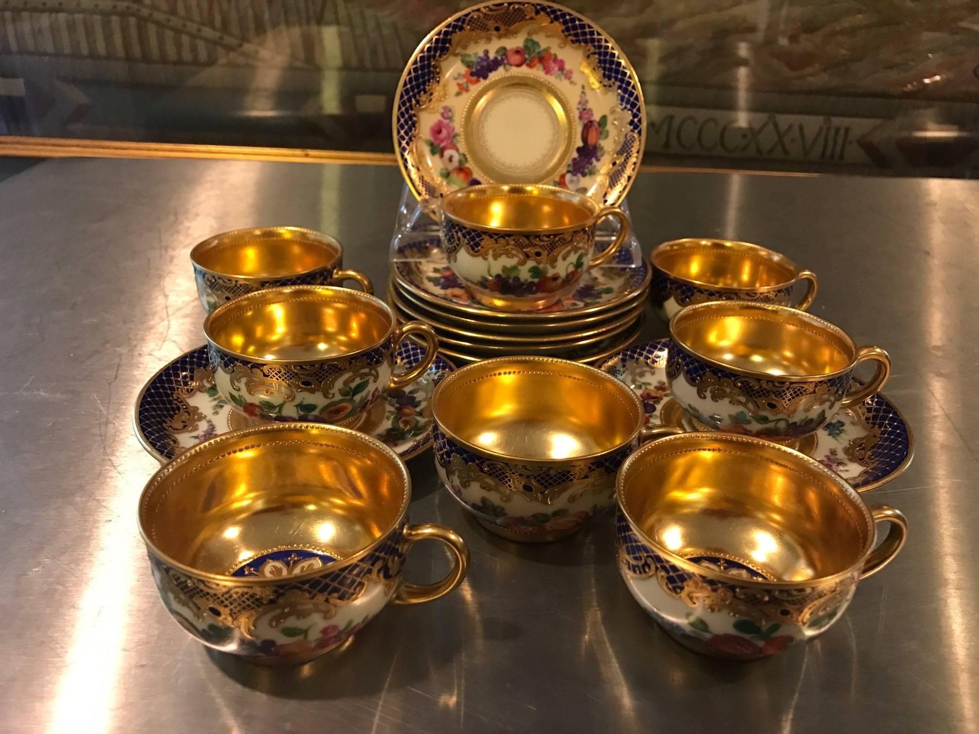 A set of eight espresso cups and saucers with hand-painted and gilt decoration. Exceptional quality and highly skilled artistic detail. These are painted by the best artist available at the time, Ambrosius Lamm.
Has blue overglaze with gold rose
