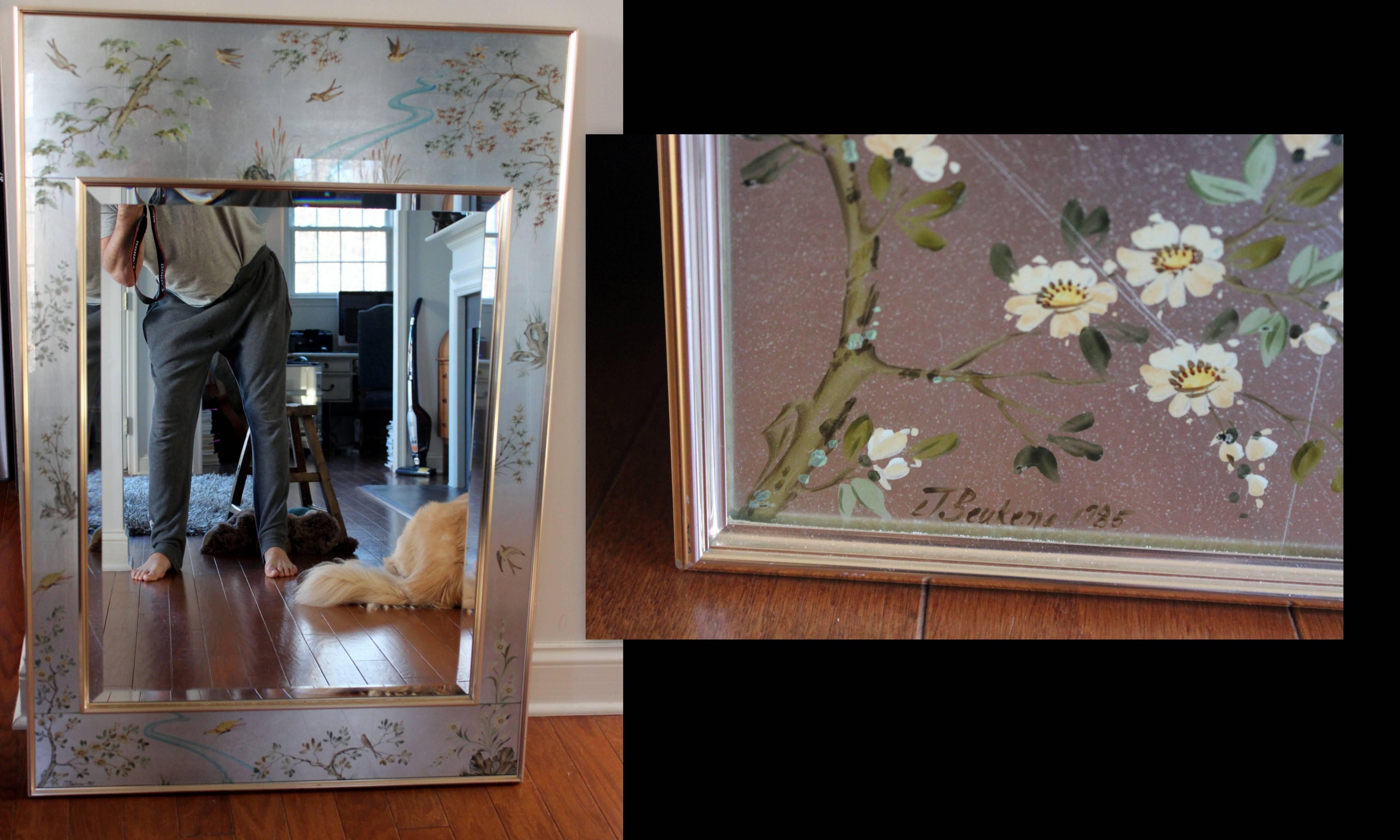 Two La Barge chinoiserie reverse hand-painted glass, gilt and églomisé mirrors, both signed one in 1978 and one in 1983. Beveled mirrors one chrome and one gold anodized aluminum gallery style surround. The mirrors are then framed by a painted