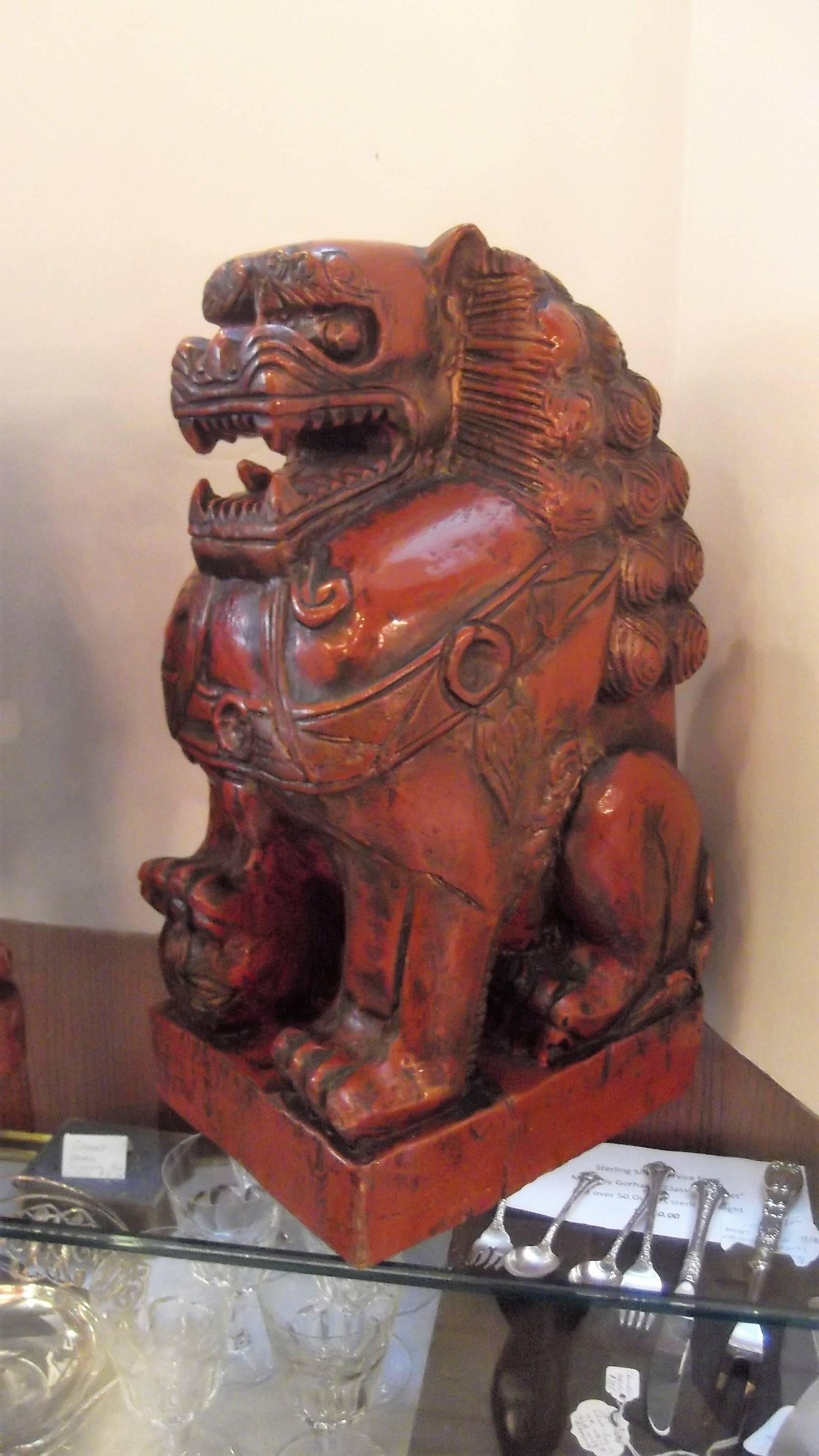 Pair of Cinnabar Lacquered Carved Wood Foo Dogs In Excellent Condition In Lambertville, NJ