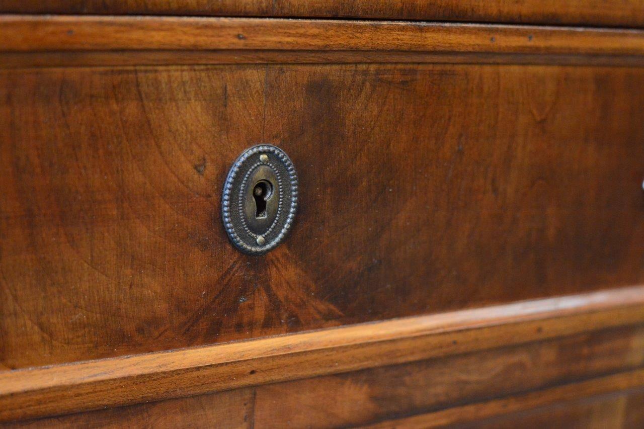 Beautiful patina on this French walnut Louis XVI-style commode which features a grey and white marble top and brass key-holes and drawer pulls,
circa 1910
Very good condition. Normal signs of age. Age crack on the side.