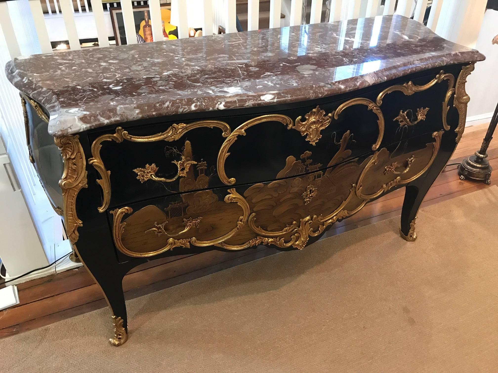 Exception hand-painted French Louis XV Style Chenoiserie chest with original marble top. In the manner of Bernard II Van Risenburgh. This exceptional commode with superb gilt bronze mounts. The body with a black background with hand painted Asian