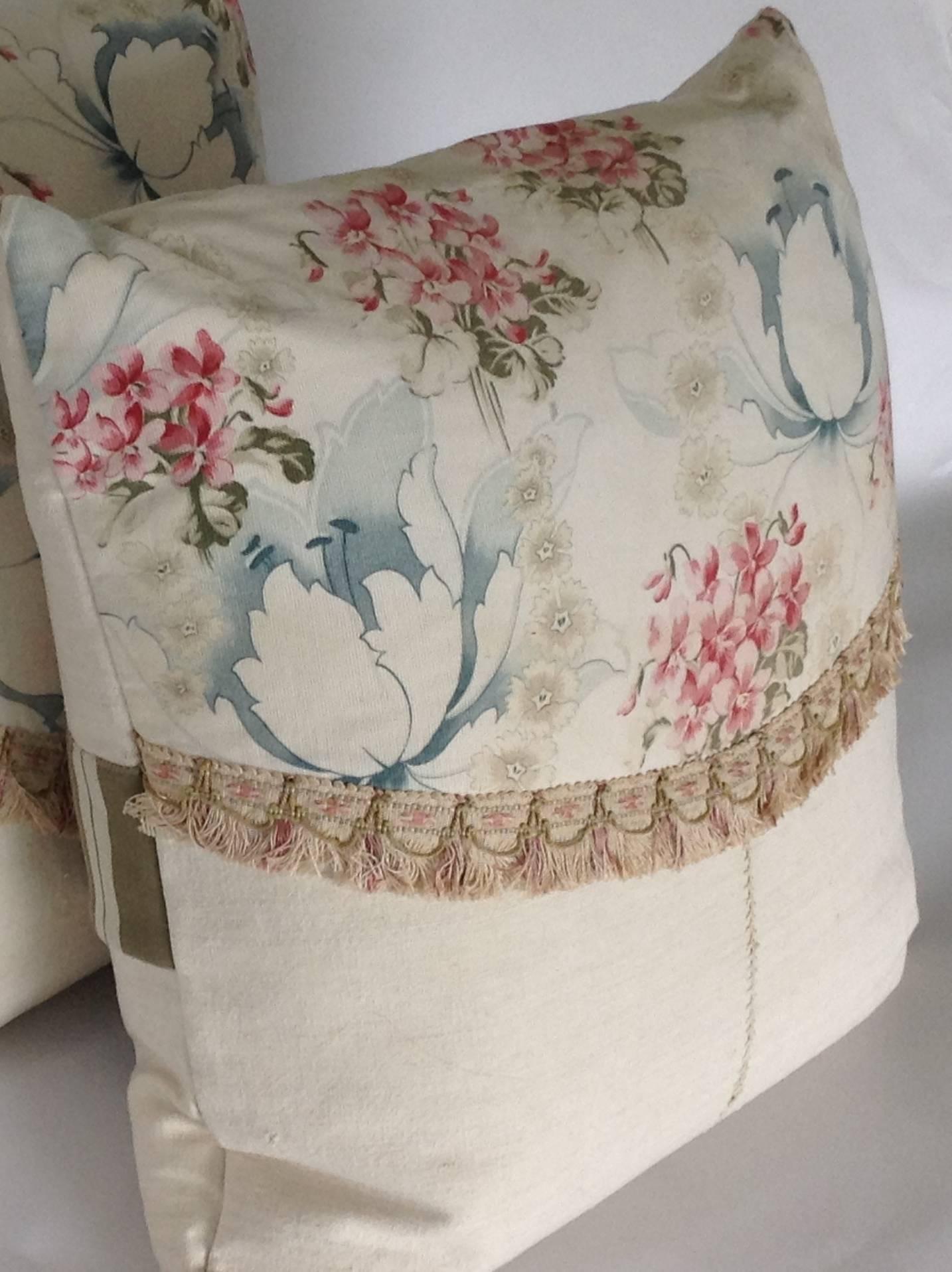This fabulous handmade pair of features:

An antique French printed cotton and homespun linen accented with a lovely cotton trim.
Notice the incredible detail on the linen. Two home spun panels where hand-stitched together creating the beautiful