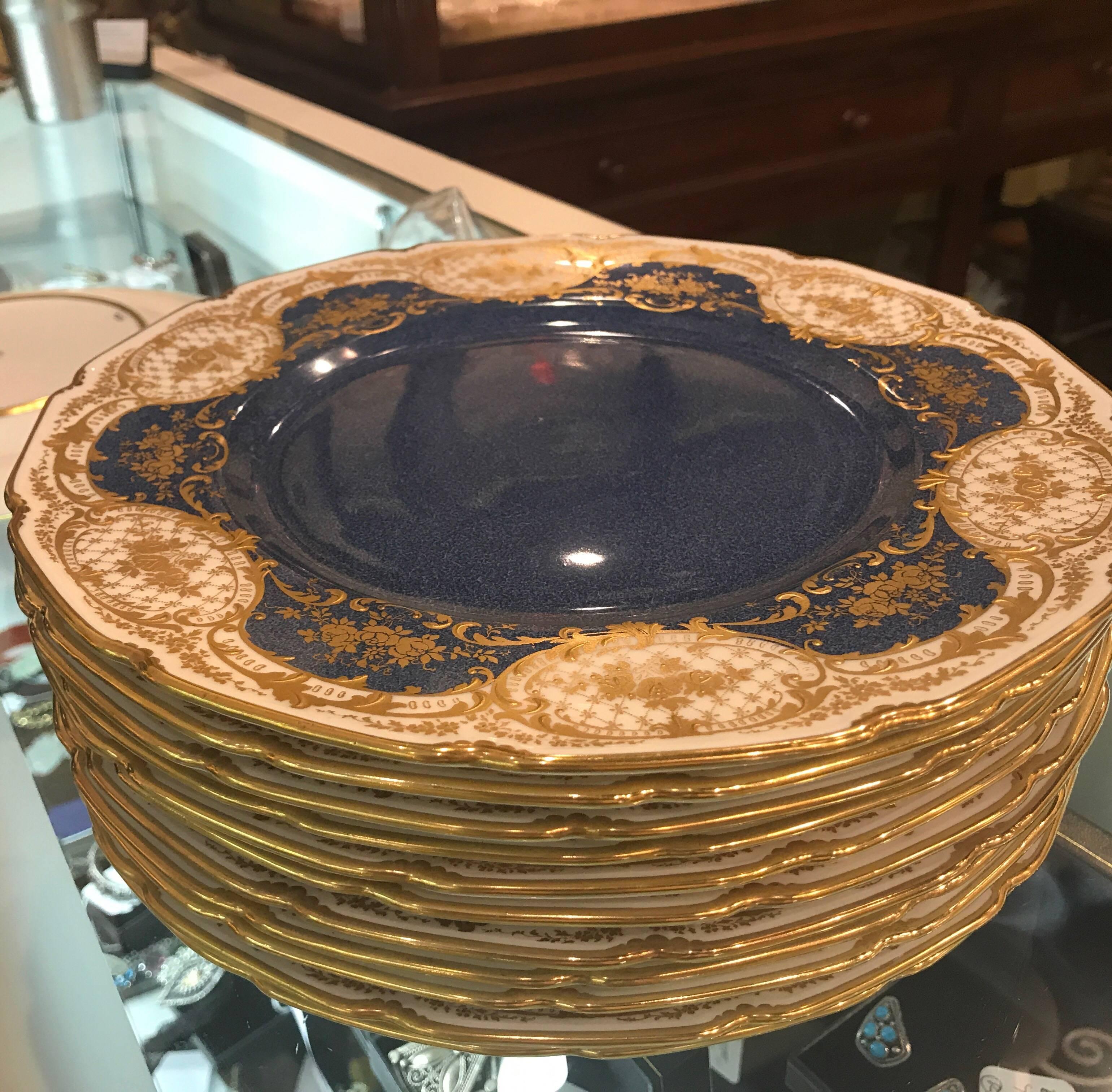 Early 20th Century Set of 12 Sumptuous English Raised Gilt Service Plates