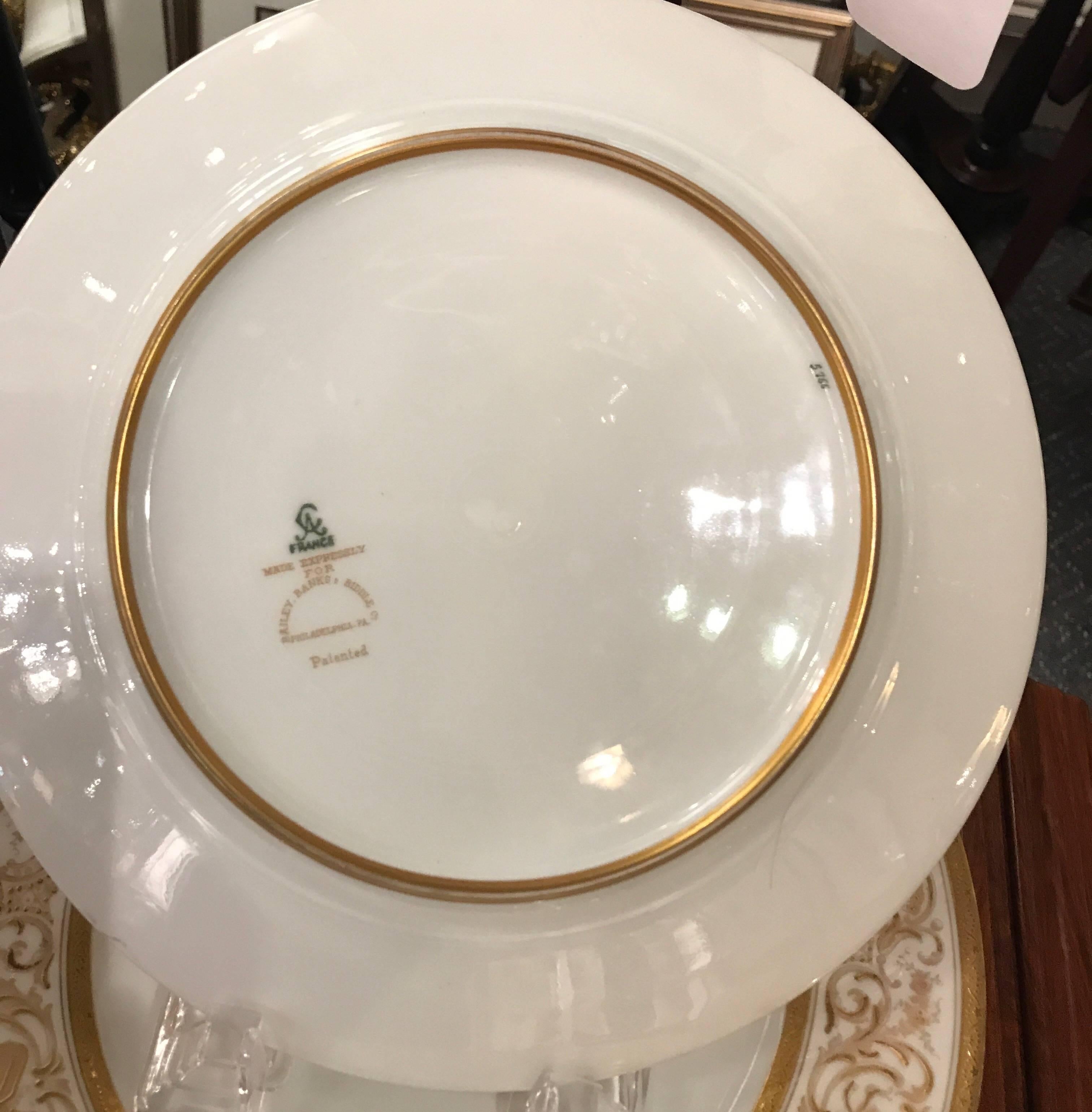 Porcelain Set of Ten French Plates with Raised Gilt Borders