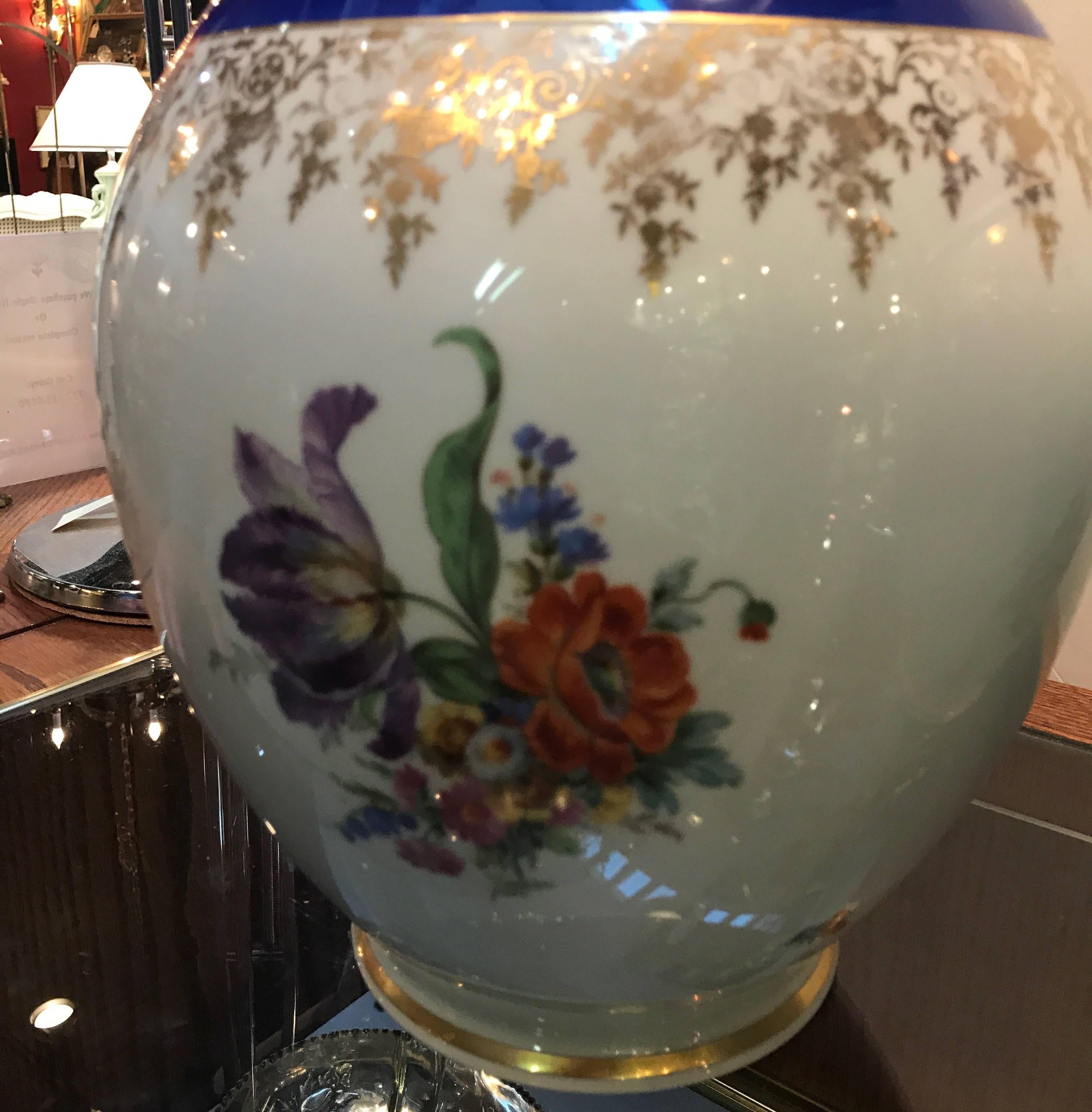 Large pair of bulbous porcelain vase marked Rosenthal. The sprigs of floral decoration is a Dresden flower pattern with deep blue necks. Marked Rosenthal and Selb Plossberg.