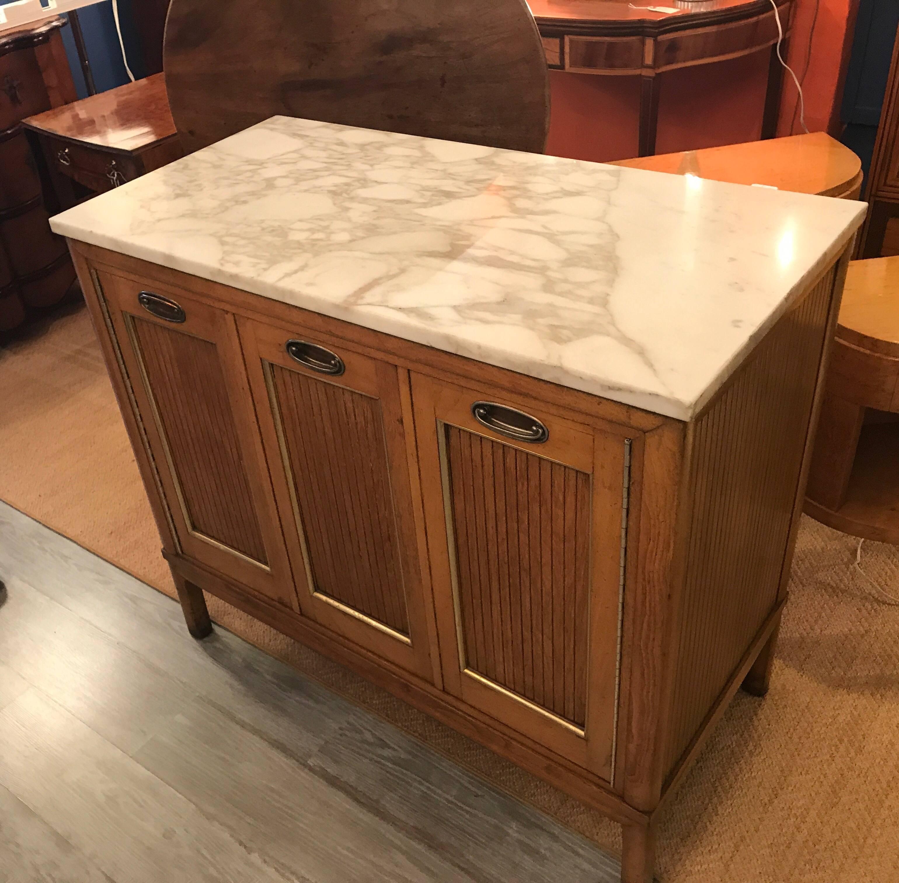 Stylish MCM marble-top server bar cart. The nicely textured front doors that open to reveal a central shelf with ample storage. The sides are finished off the same as the from. A great side piece and perfect as a dry bar.