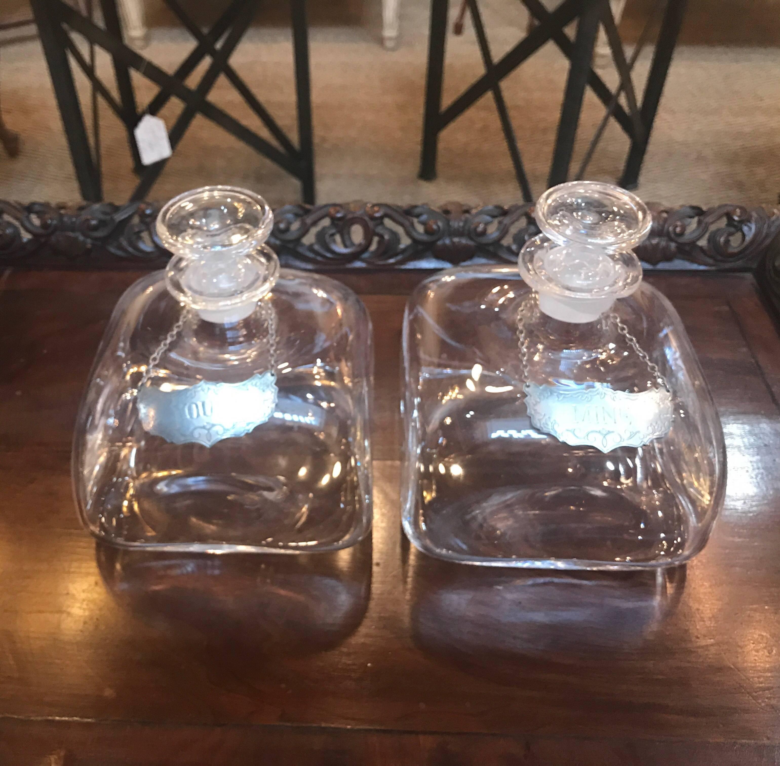 European Pair of Blown Glass Spirit Decanters with Pewter Labels