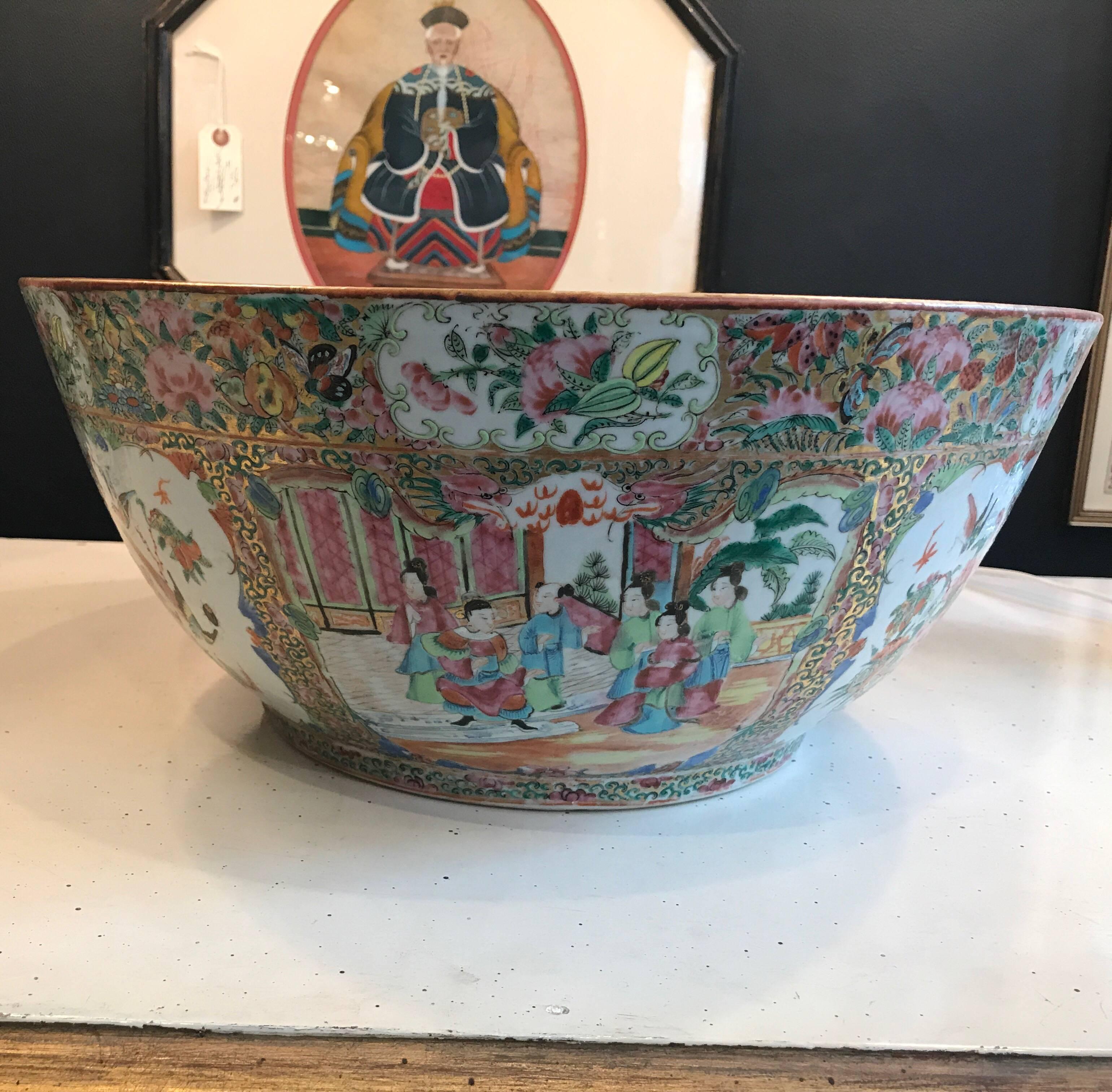 Very large Chinese porcelain rose medallion punch bowl, 19th century. Impressive size with hand painted and gilt decoration all over. A full 16 inches in diameter.
