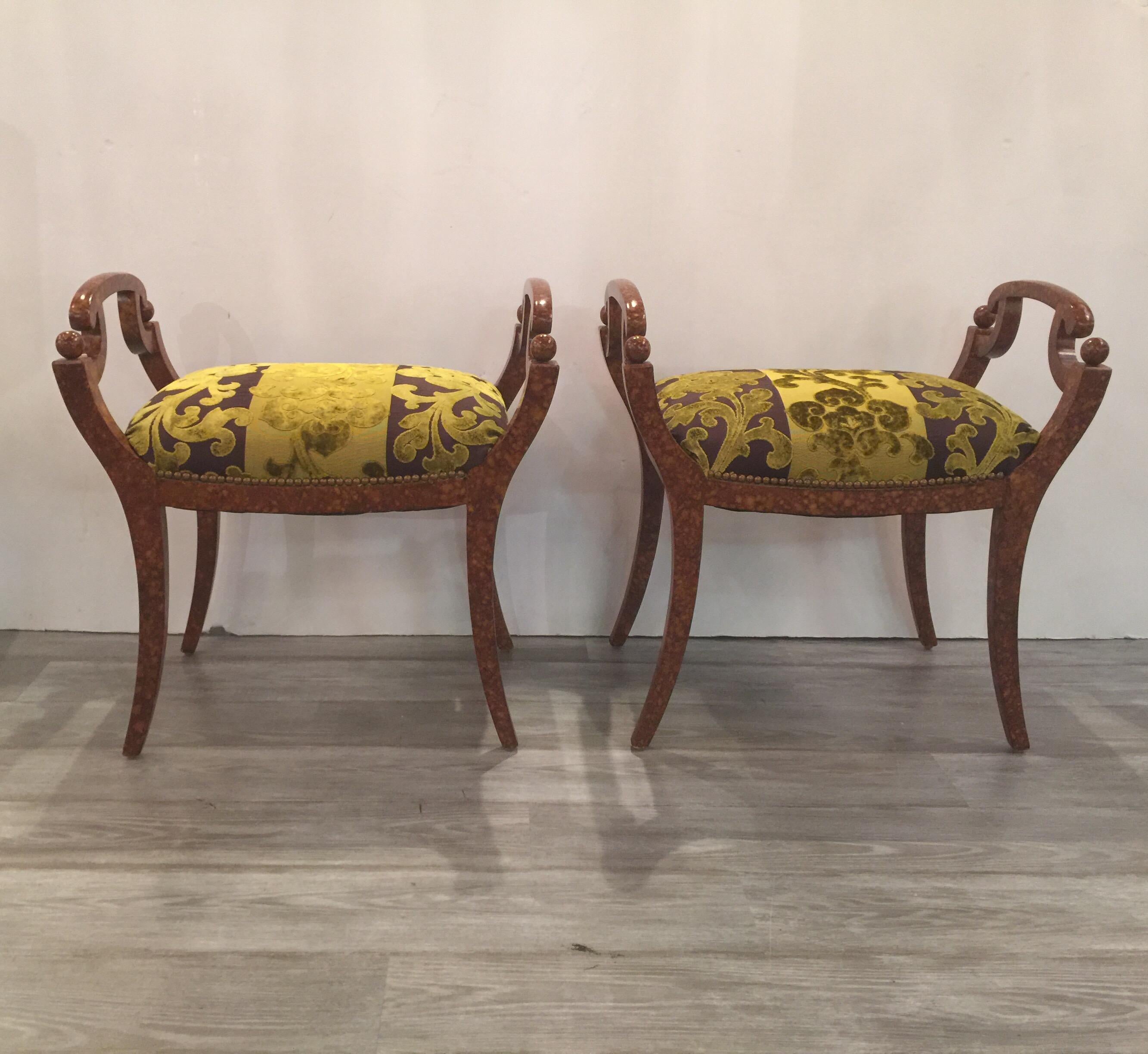 A shapely pair of Biedermeier style benches with new upholstery. The elegant frames with a smoky faux tortoise finish with a bold chartreuse damask pattern velvet, mid-20th century.
    