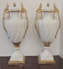 Large Pair of Porcelain Bisque Mantle Urns with Gilt Mounts