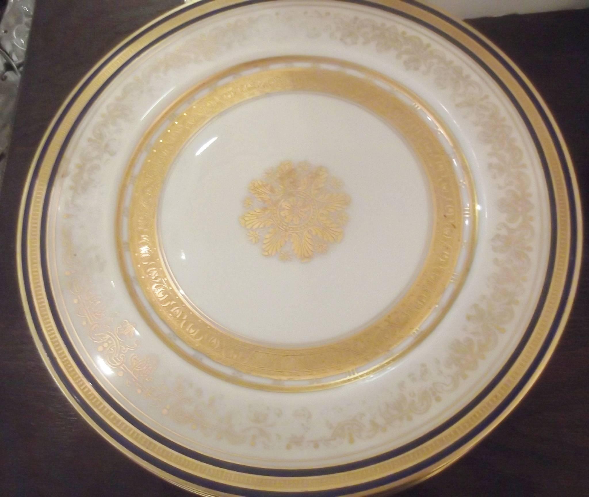 Porcelain Set of 12 Cobalt Trimmed and Gilt Service Plates