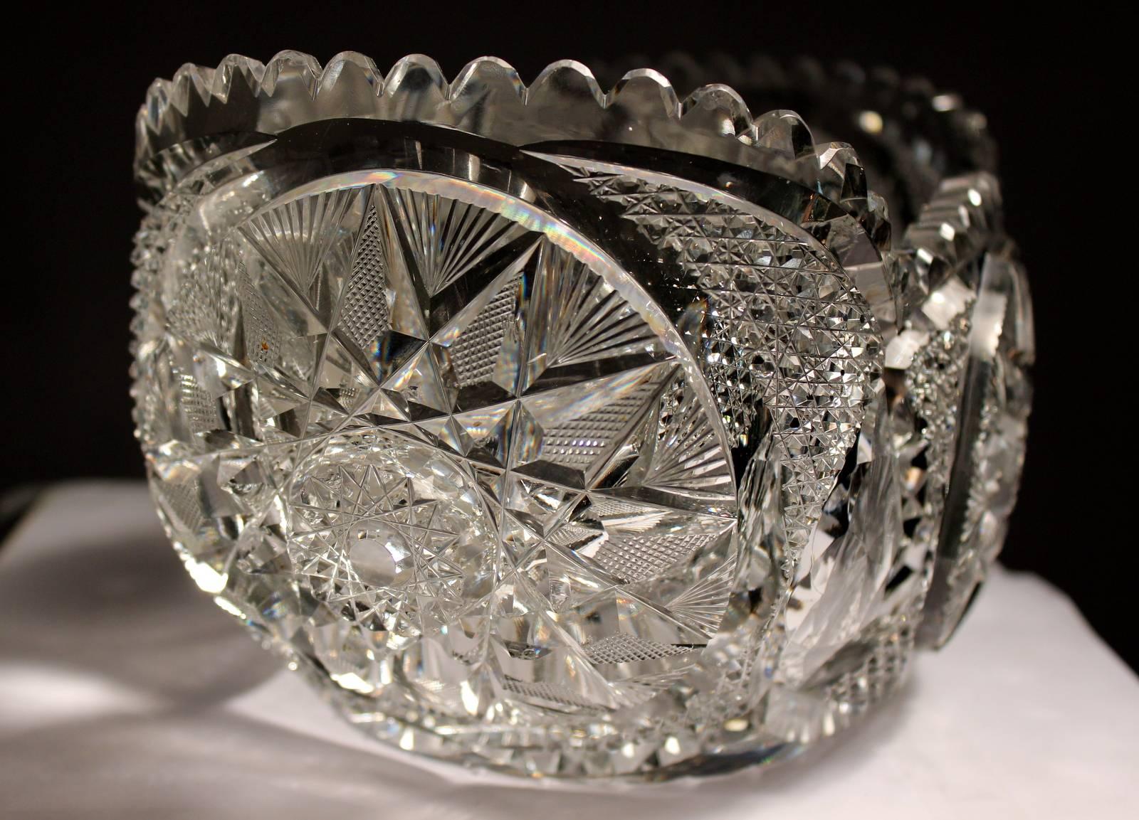 Extraordinary American brilliant period late 19th century heavy cut-glass center bowl. The deeply hand cut and polished pattern is the work of a master cutter of American brilliant mirror finish glass mainly from the coring New York area. The