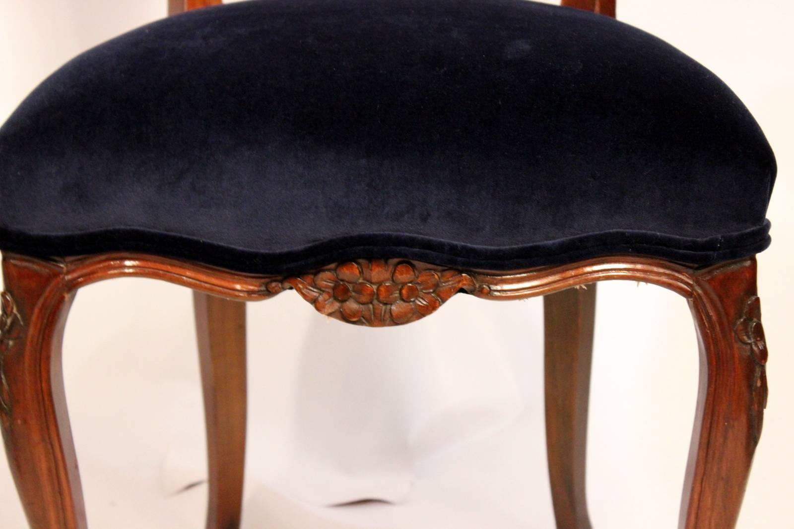 Six dining room chairs with navy velvet silver and navy damask fabric.
Newly upholstered on 1920s period mahogany chairs.
Two armchairs.
Four side chairs.