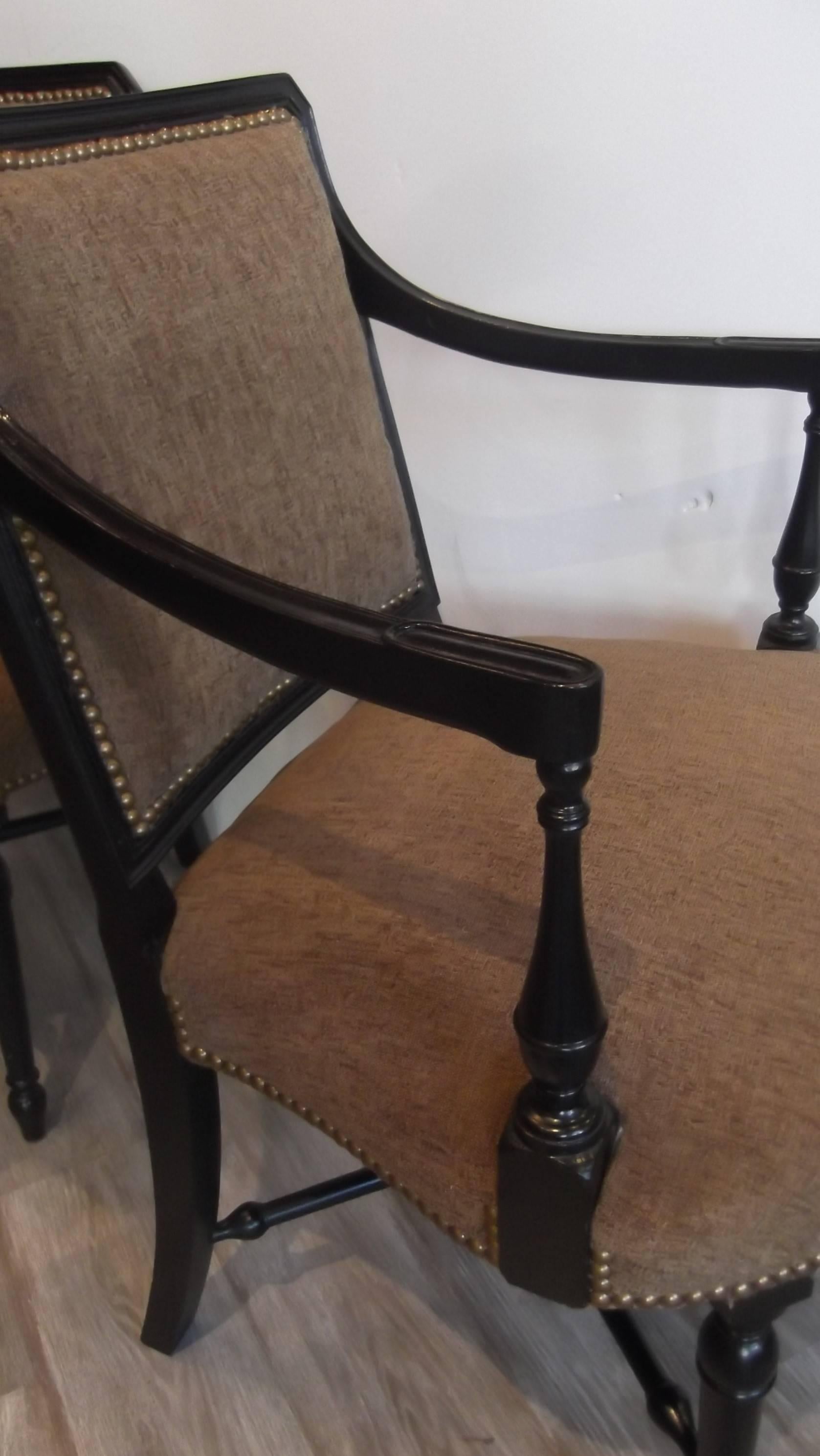 Brass Pair of Edwardian Ebonized Upholstered Arm Chairs