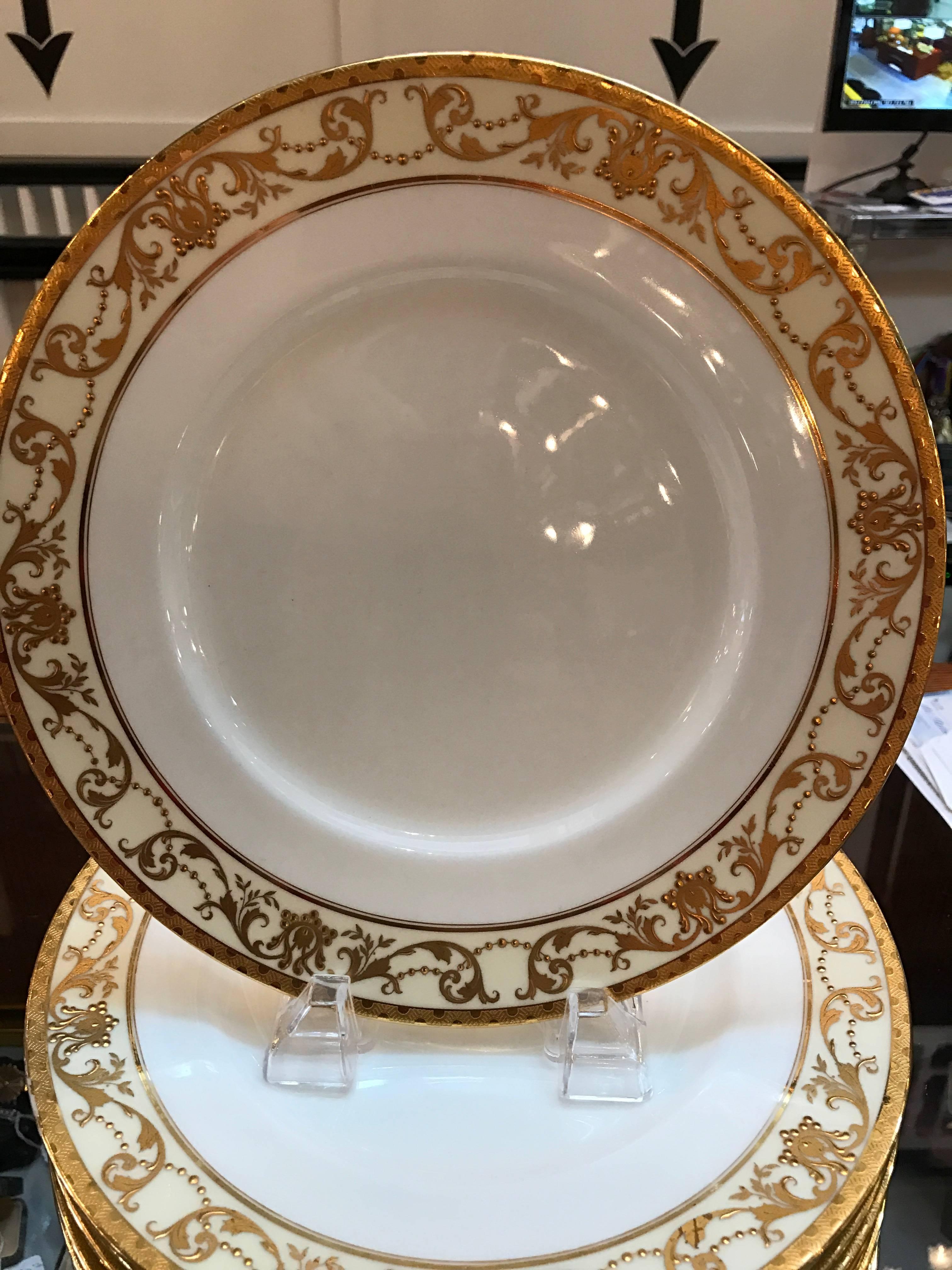 Edwardian Set of 12 Gold Encrusted English Raised Gilt Service Plates