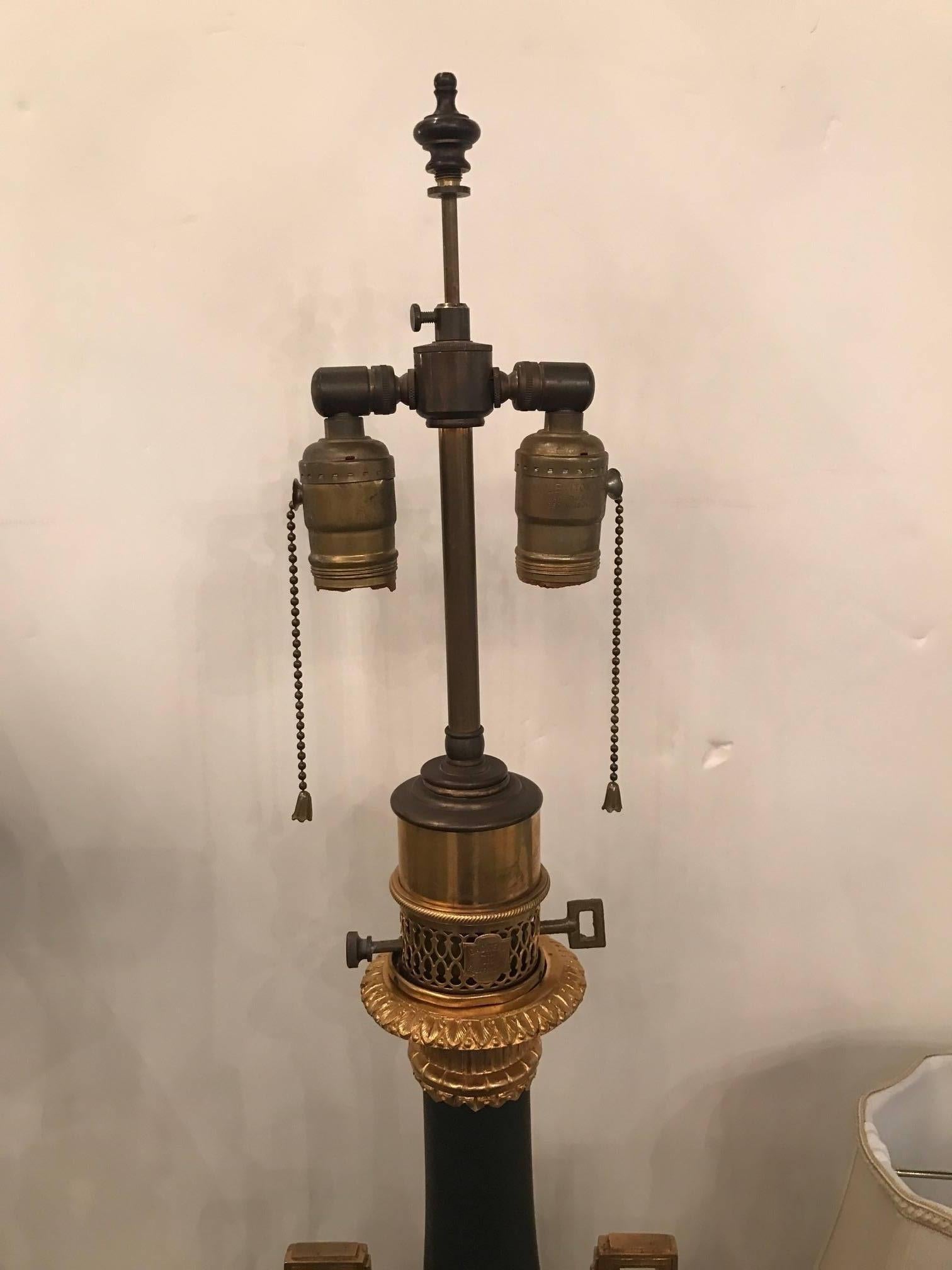 Pair of French Patinated Bronze Oil Lamps with Ormolu Mounts 3