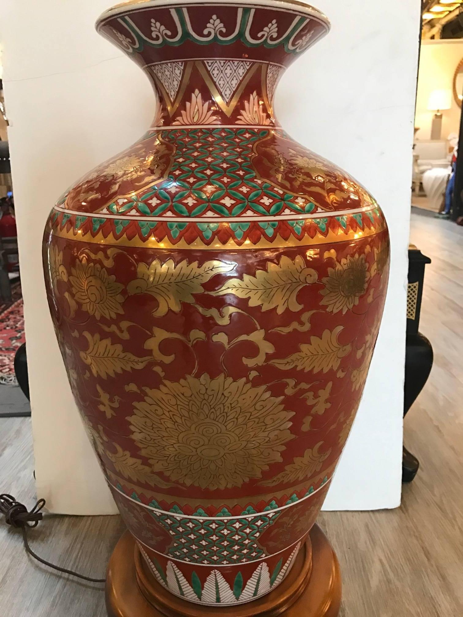 Oversized Japanese porcelain Kutani lamp. Hand decorated custom porcelain with wood base. The vase is 14 inches diameter, 27.5 inches high to the top of the vase.