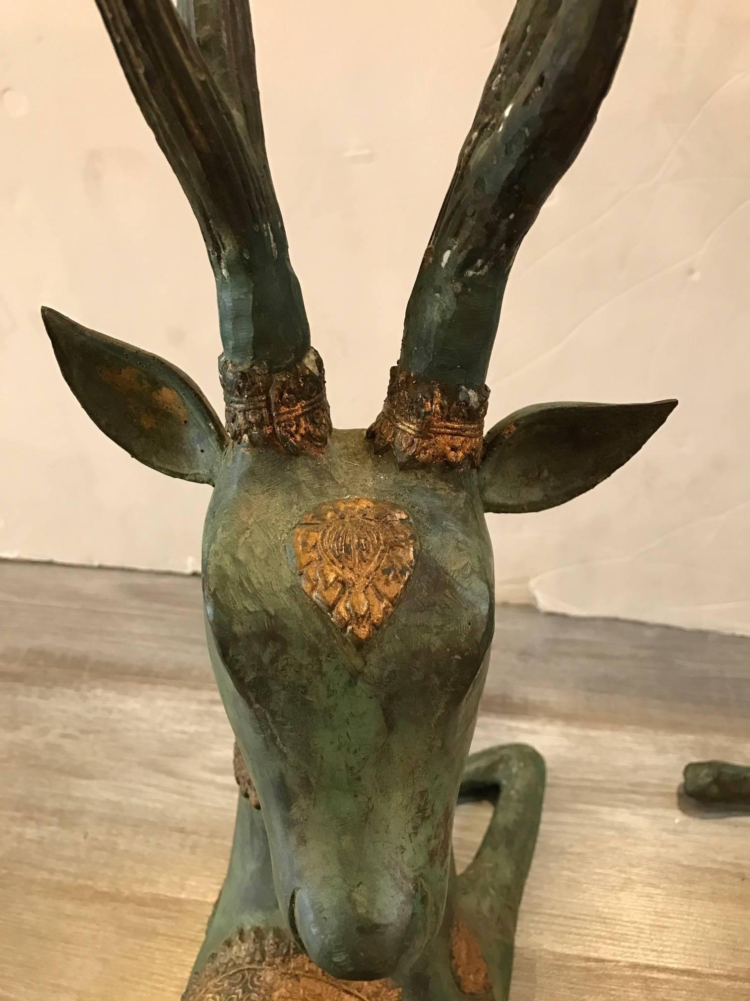 Pair of Patinated and Parcel Gilt Bronze Deer Stags In Excellent Condition In Lambertville, NJ