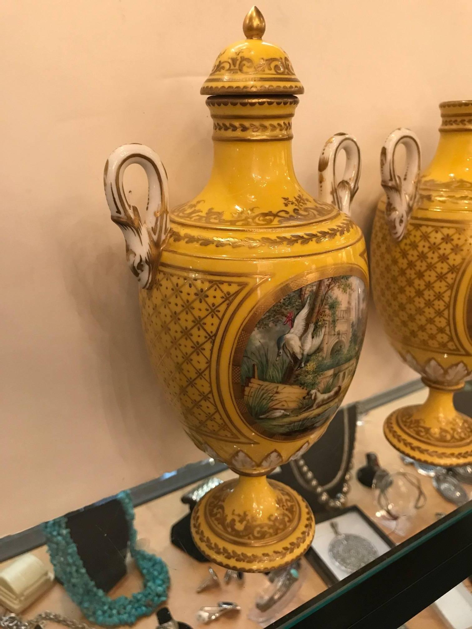 Pair of 19th Century Hand-Painted French Porcelain Lidded Urns In Excellent Condition In Lambertville, NJ