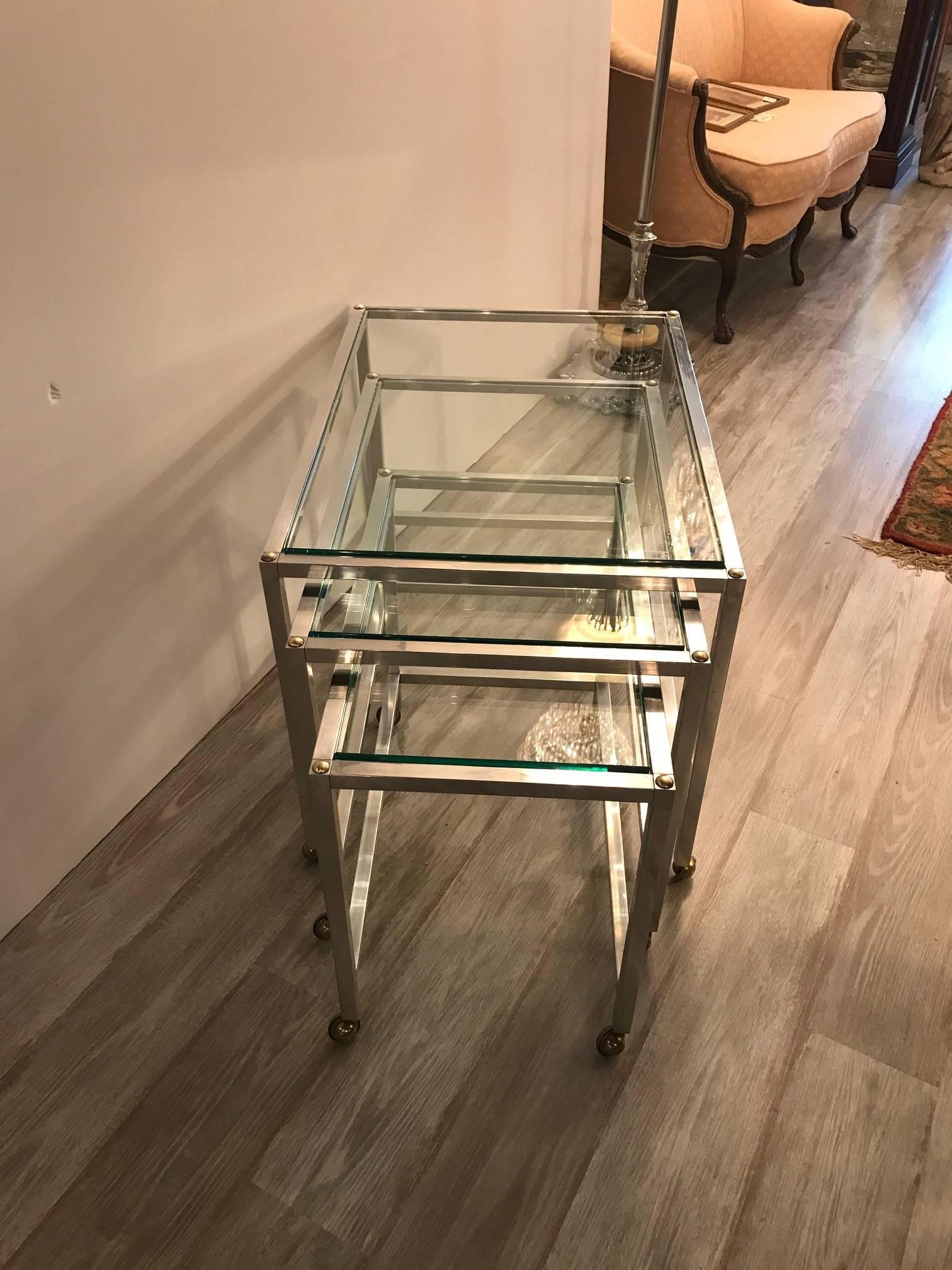 Set of Three Polished Aluminium and Glass Nesting Tables In Excellent Condition In Lambertville, NJ