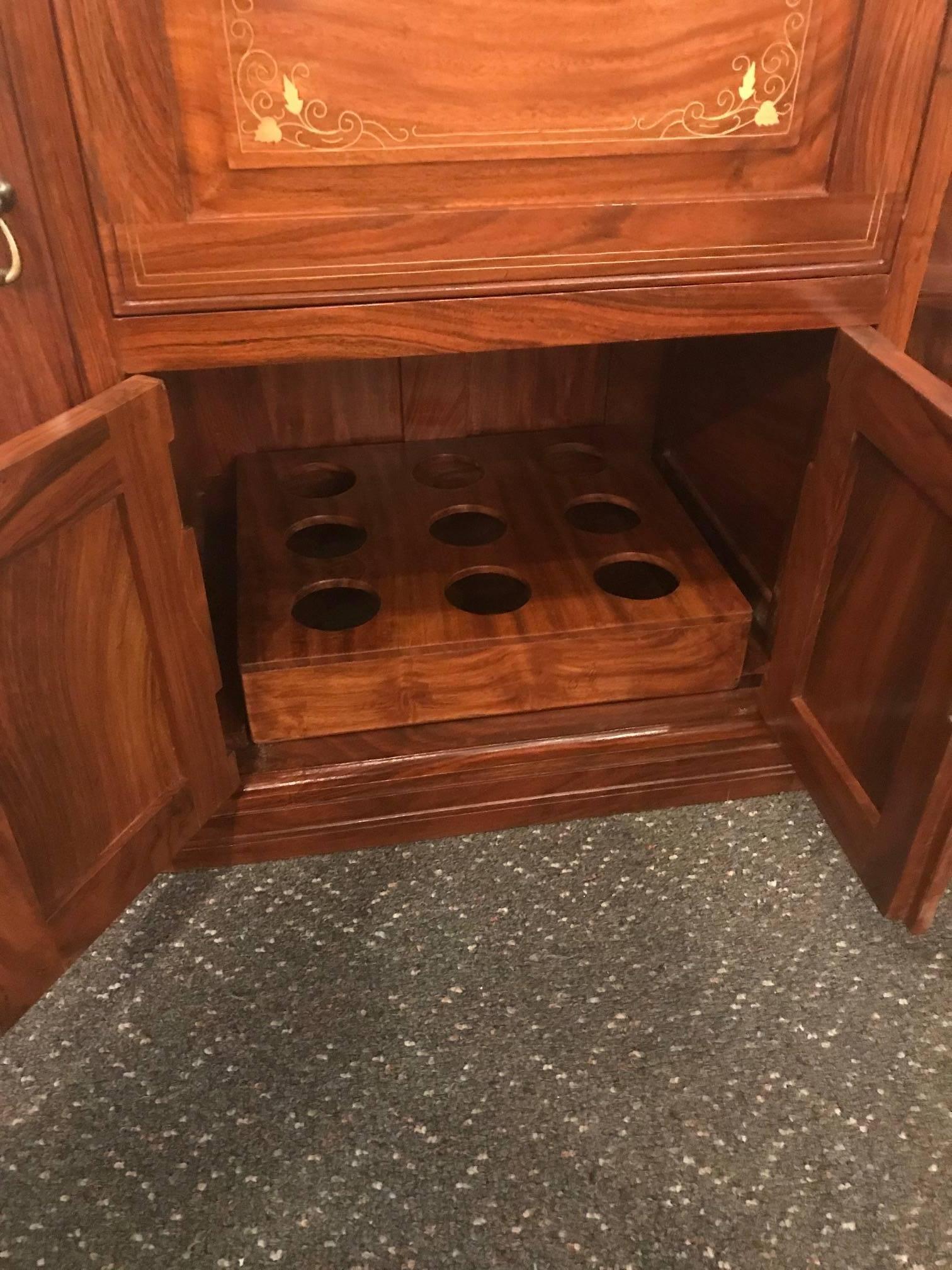 Diminutive Rosewood and Brass Inlaid Bar Cabinet In Excellent Condition In Lambertville, NJ