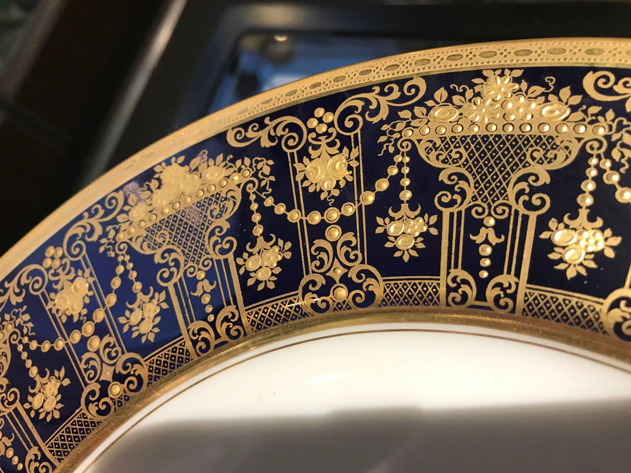 Porcelain Set of 12 Luxurious Raised Gilt and Cobalt Service Plates, circa 1910