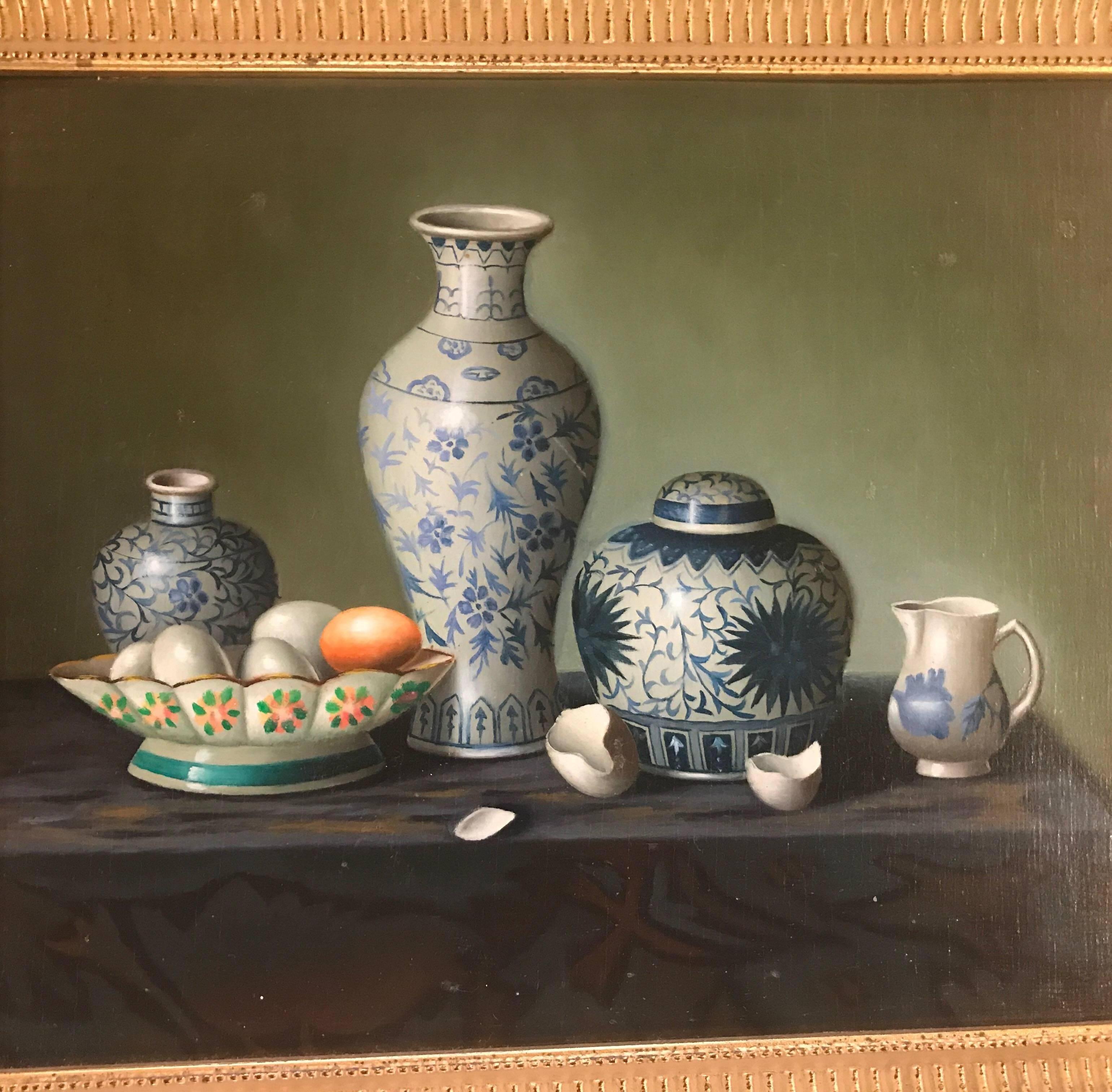 Beautifully painted pair of sill life oil on board in giltwood frames. The hyper realism style of Chinese porcelain and fruit displayed in a clear and crisp setting. European, circa 1950, unsigned.