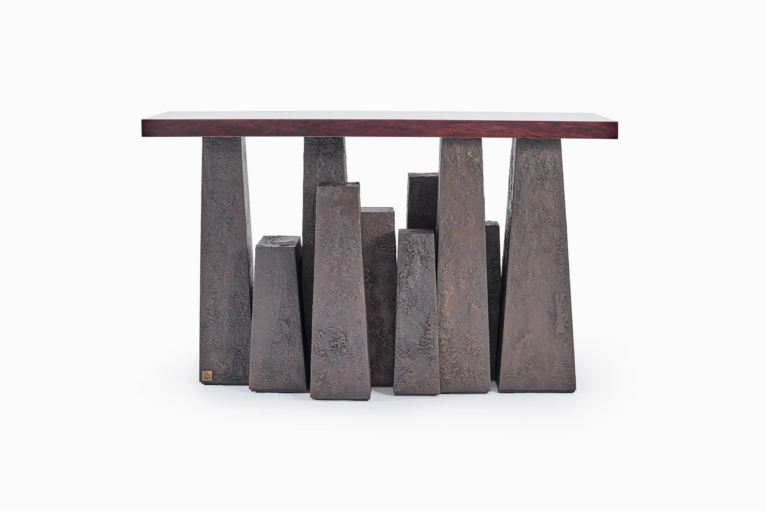The Housesteads console takes inspiration from the ancient Roman Fort, Housesteads, remains of which can be found along Hadrian's Wall in Northumberland. Like many of our consoles this piece is composed of timber and cast bronze and therefore has a
