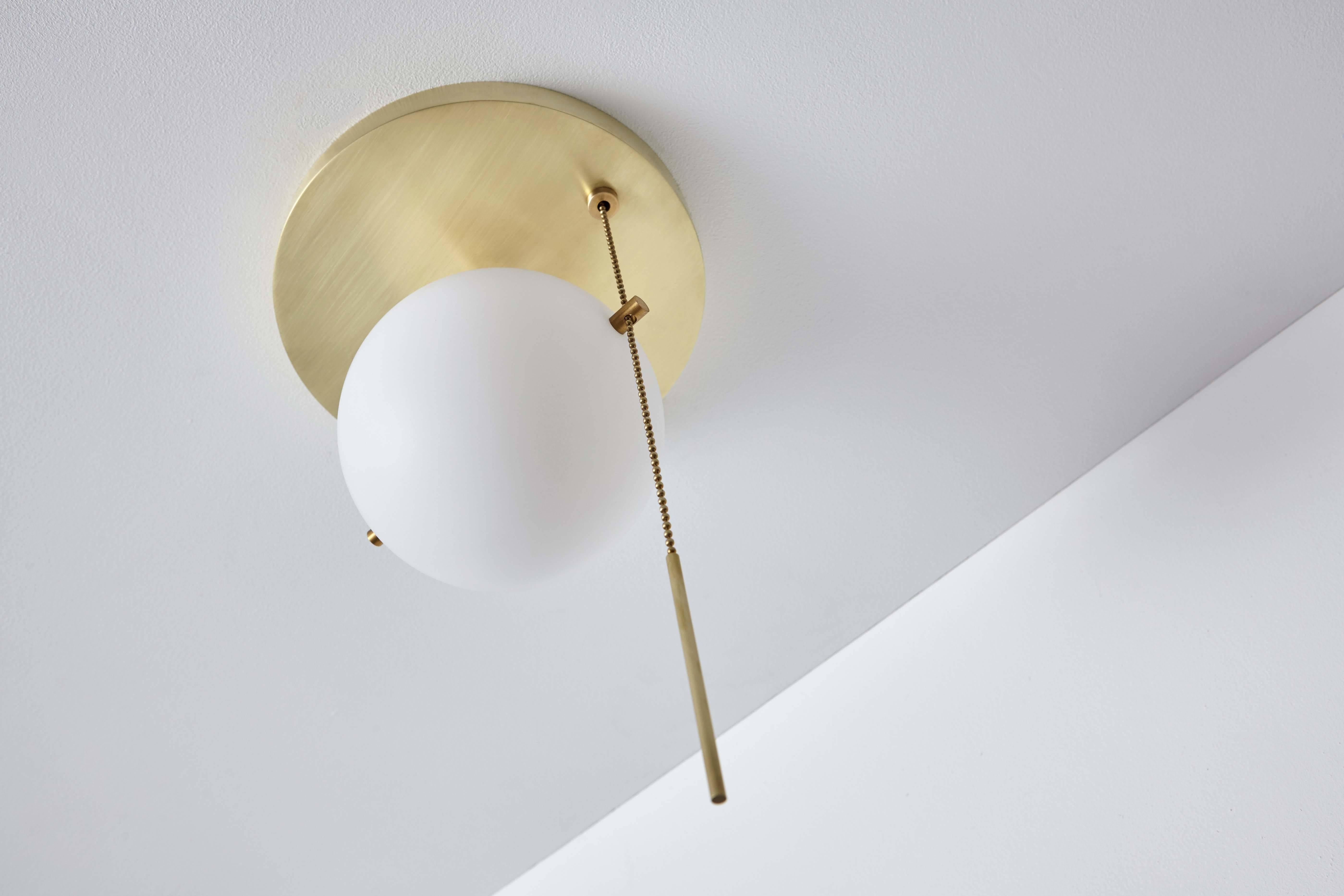 Modern Workstead Signal Flush Mount in Brass with Blown Glass Globe and Pull Chain For Sale