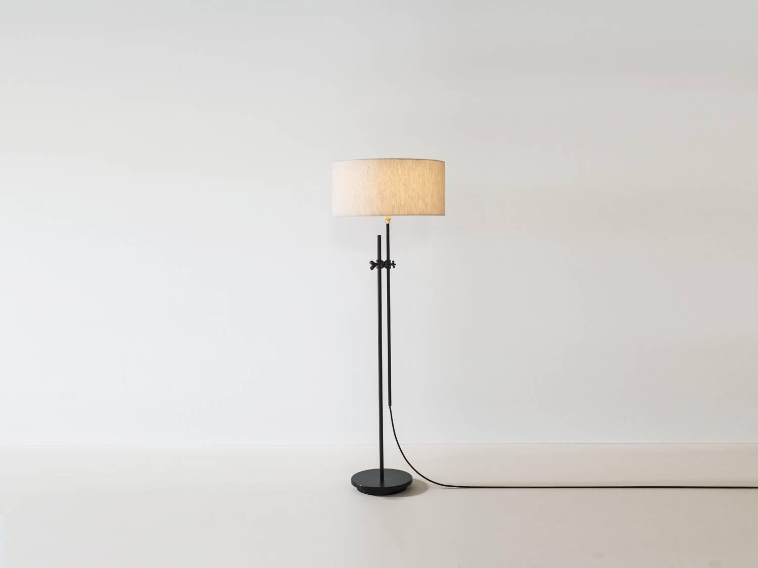 The workstead floor lamp is adjustable from 52-68
