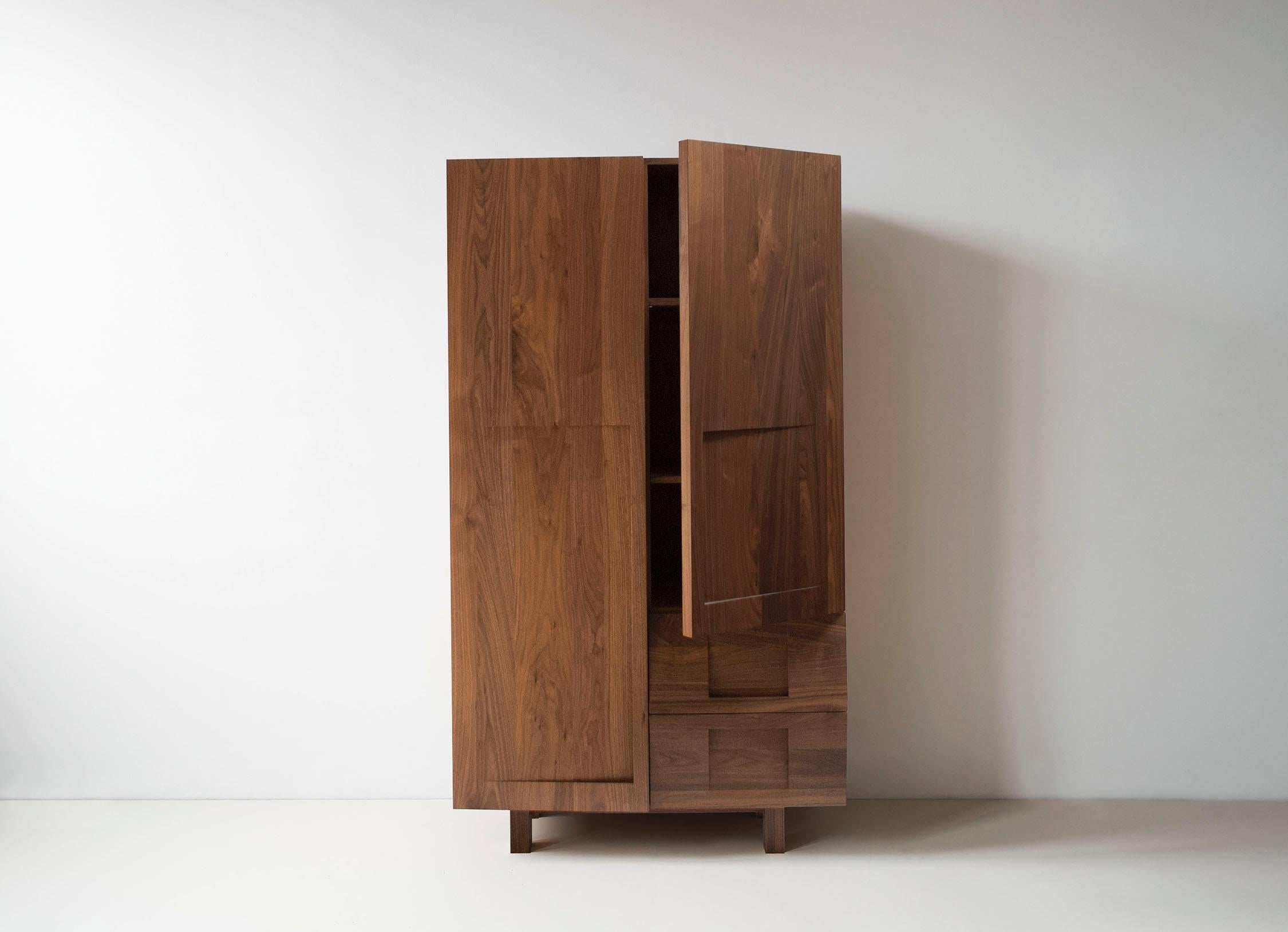 The wardrobe is one part closet, one part dresser and one part
cabinet. Featuring doors carved from solid beech, it can be
configured in numerous ways and includes a clothing rod, adjustable
shelves and drawers.