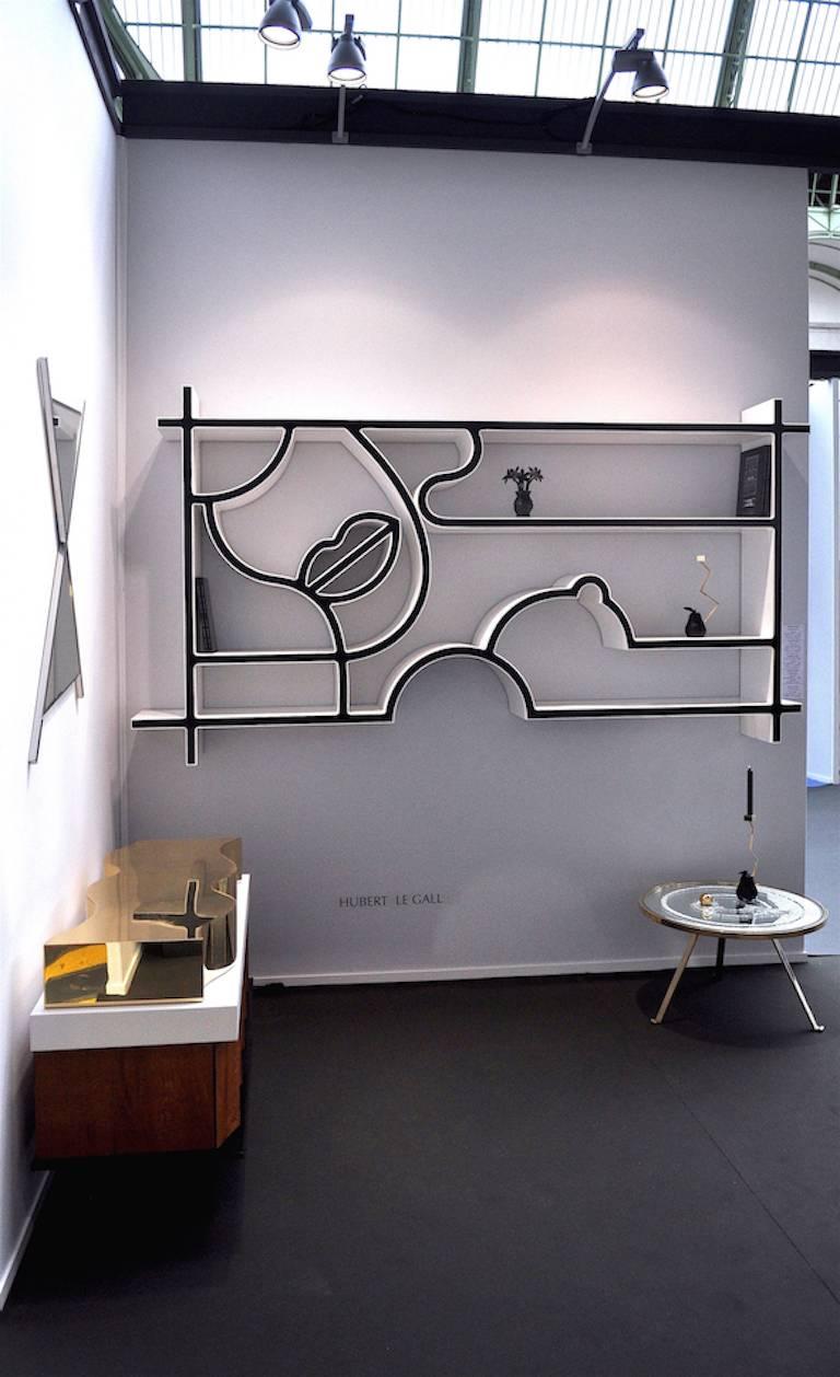 Bookcase in white lacquered wood and black paint.
Tribute to american pop artist Tom Wesselmann
Edition of 3.
2016.

Hubert le Gall was born in Lyon in 1961. After graduating in management, he decided to move to Paris in 1983. Five years later, he