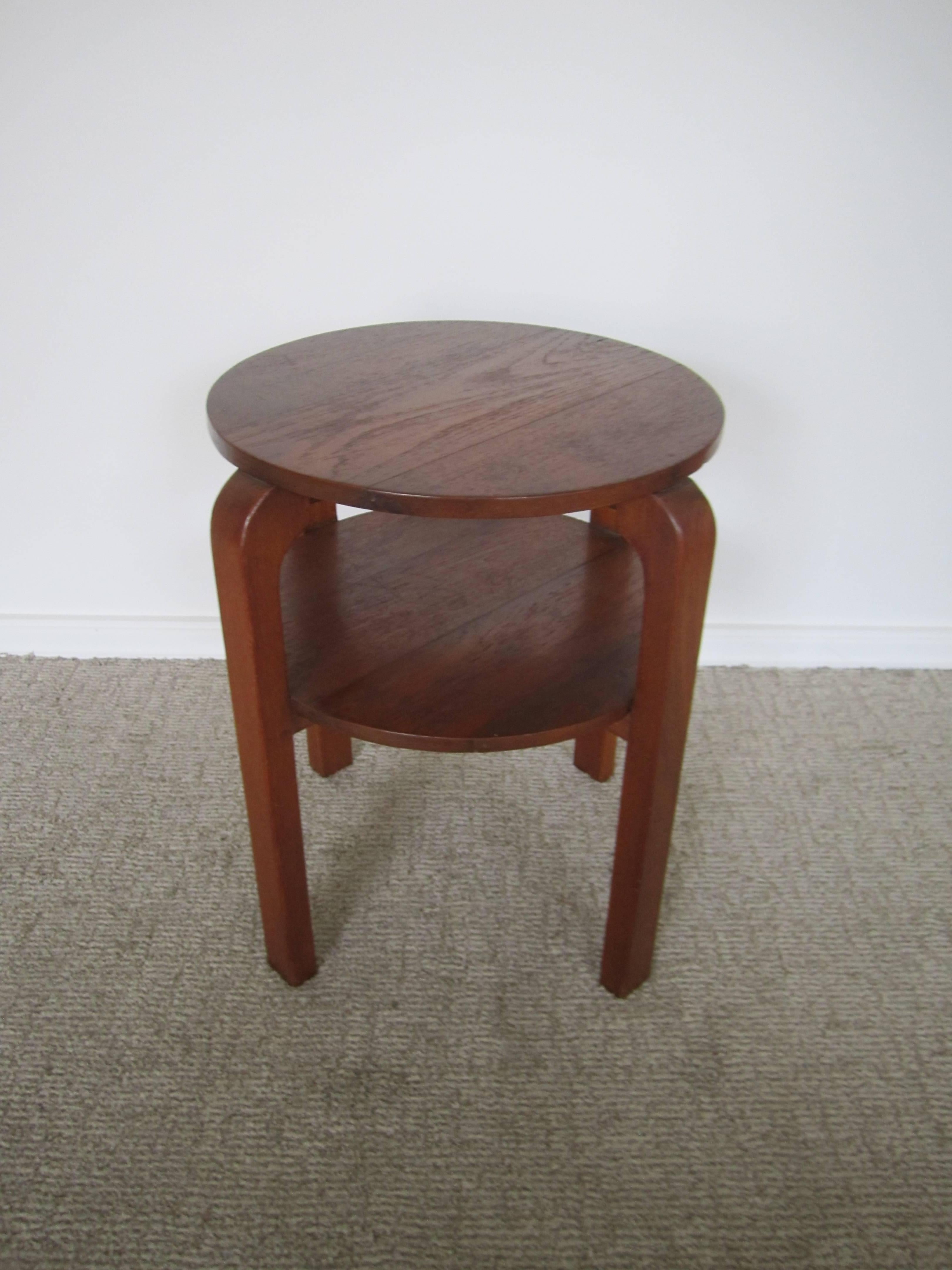 A vintage Scandinavian Modern two-tier side or occasional table in the style of Alvar Aalto. Item available here online. By request, item can be made available by appointment to the Trade (in New York.) 
