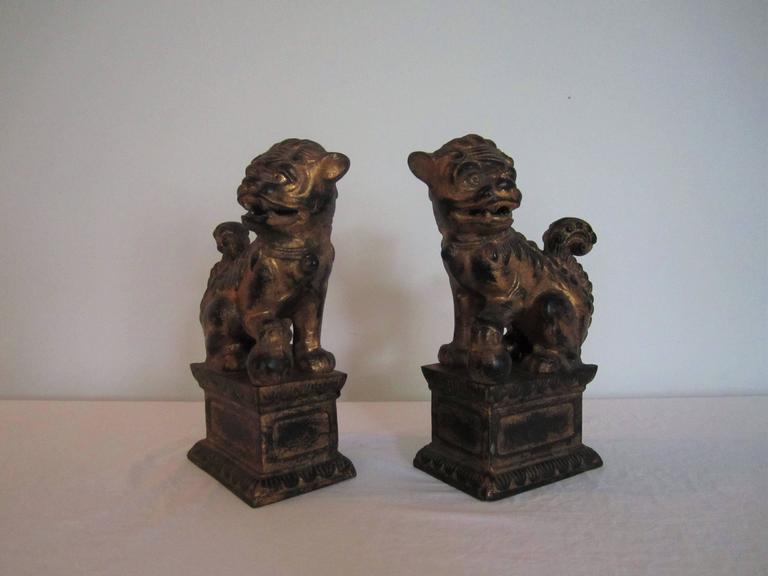 Vintage Black and Gold Foo Dog Bookends at 1stdibs